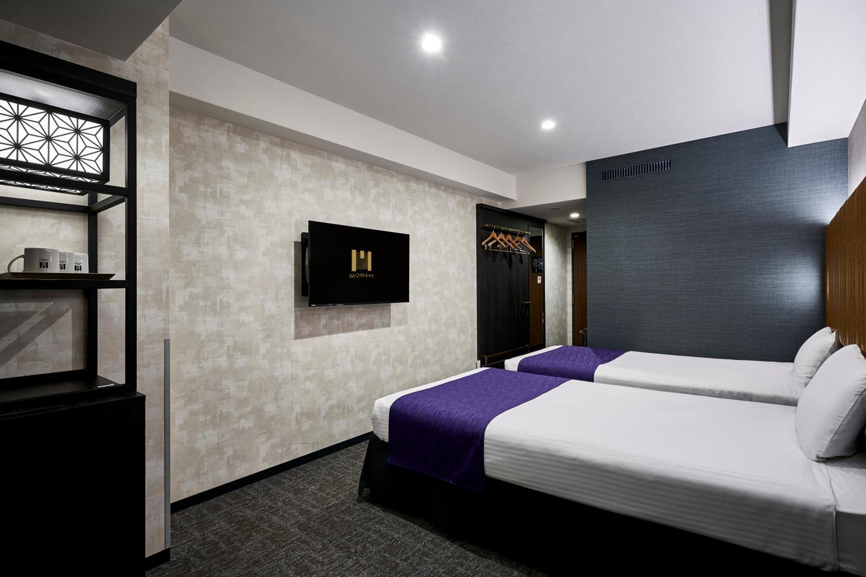 Deluxe Twin Room with Sofa bed and Extra bed - Photo 7