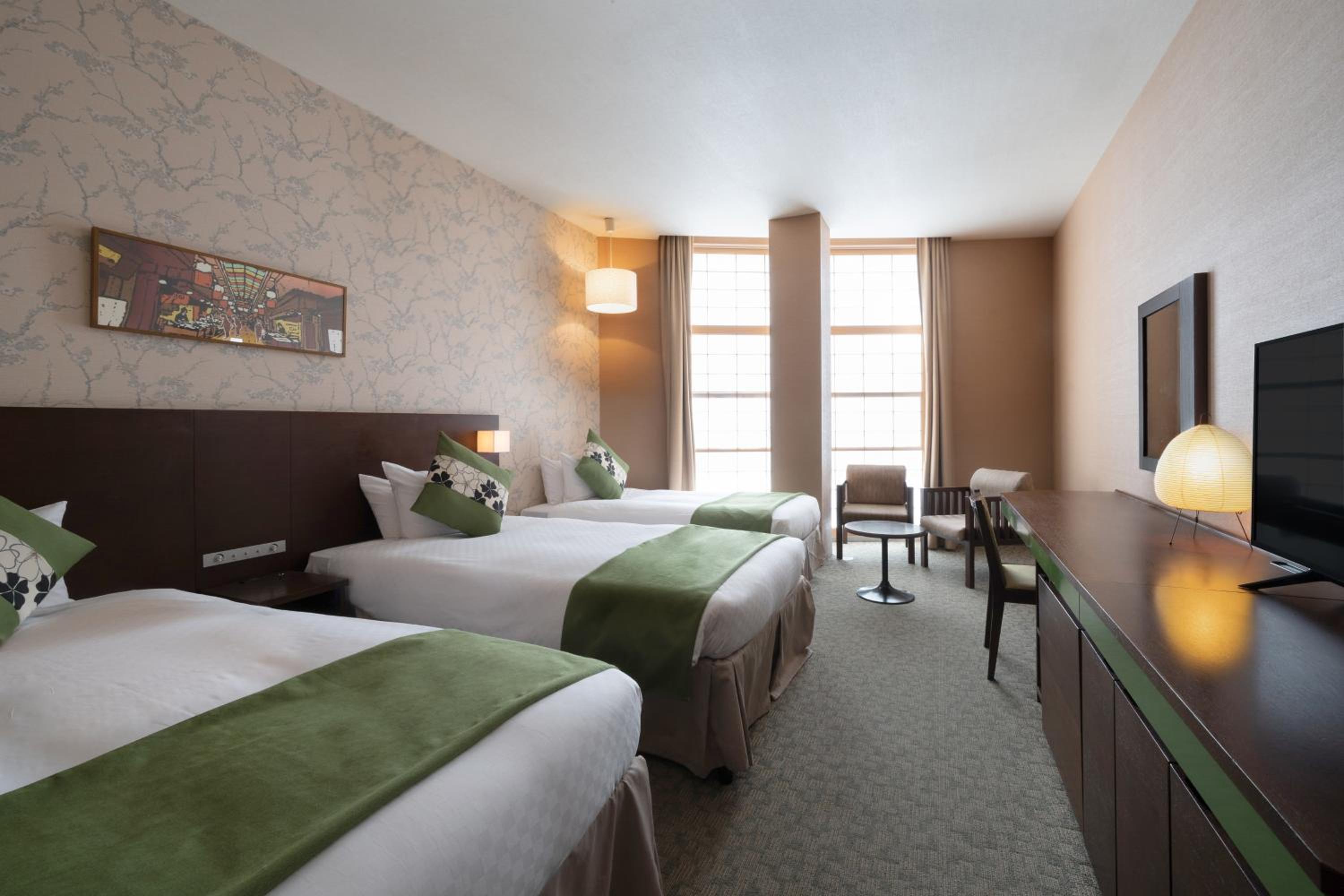 Deluxe Twin Room With Extra Bed photo 3