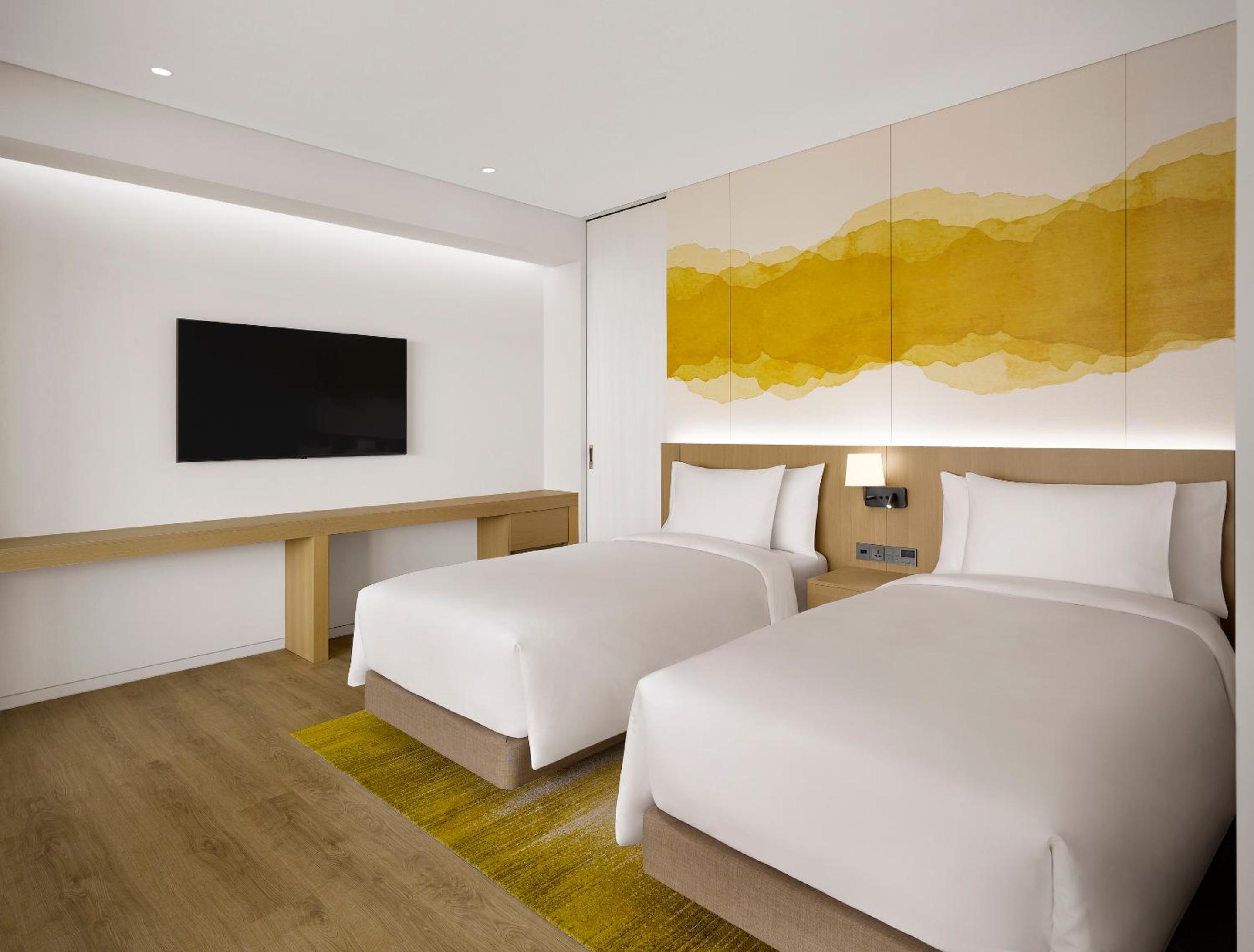 [Stay & Relax PKG] One Bedroom Suite Twin Partial Ocean View with Breakfast for 2 once per night + Swimming Pool Access+Sauna for 2 once per night