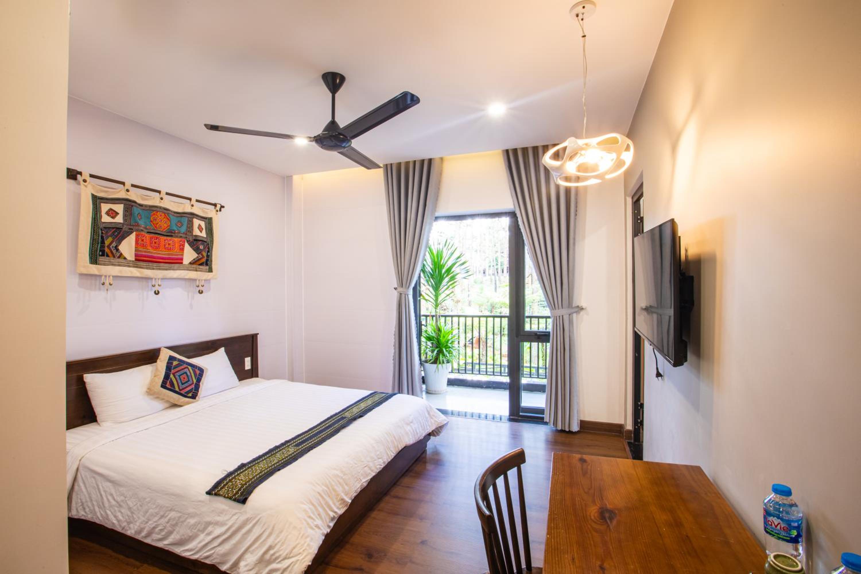 Quadruple Room with Balcony - Photo 1