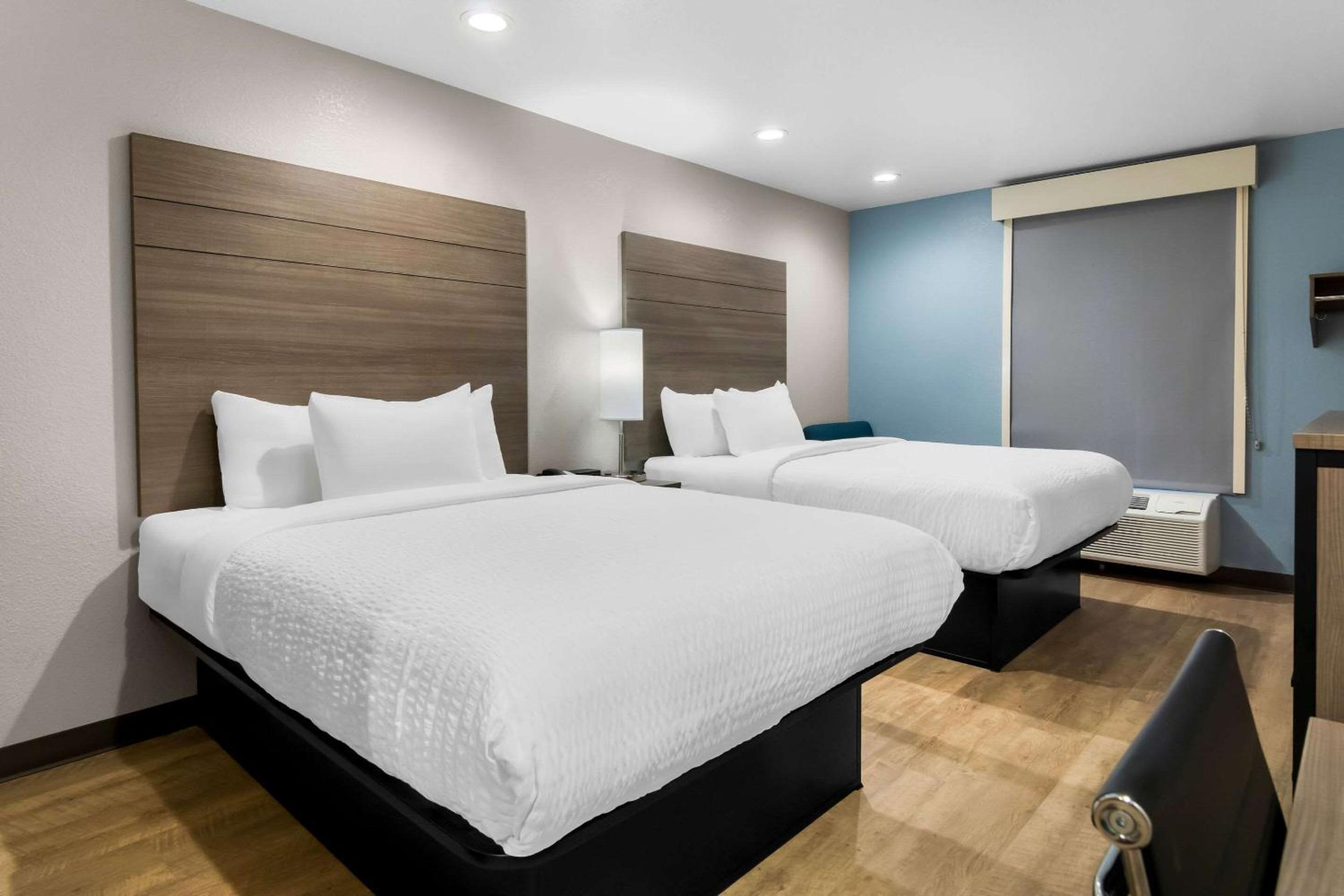 Quadruple Room with Two Queen Beds - Non Smoking/Interior Hall photo 2