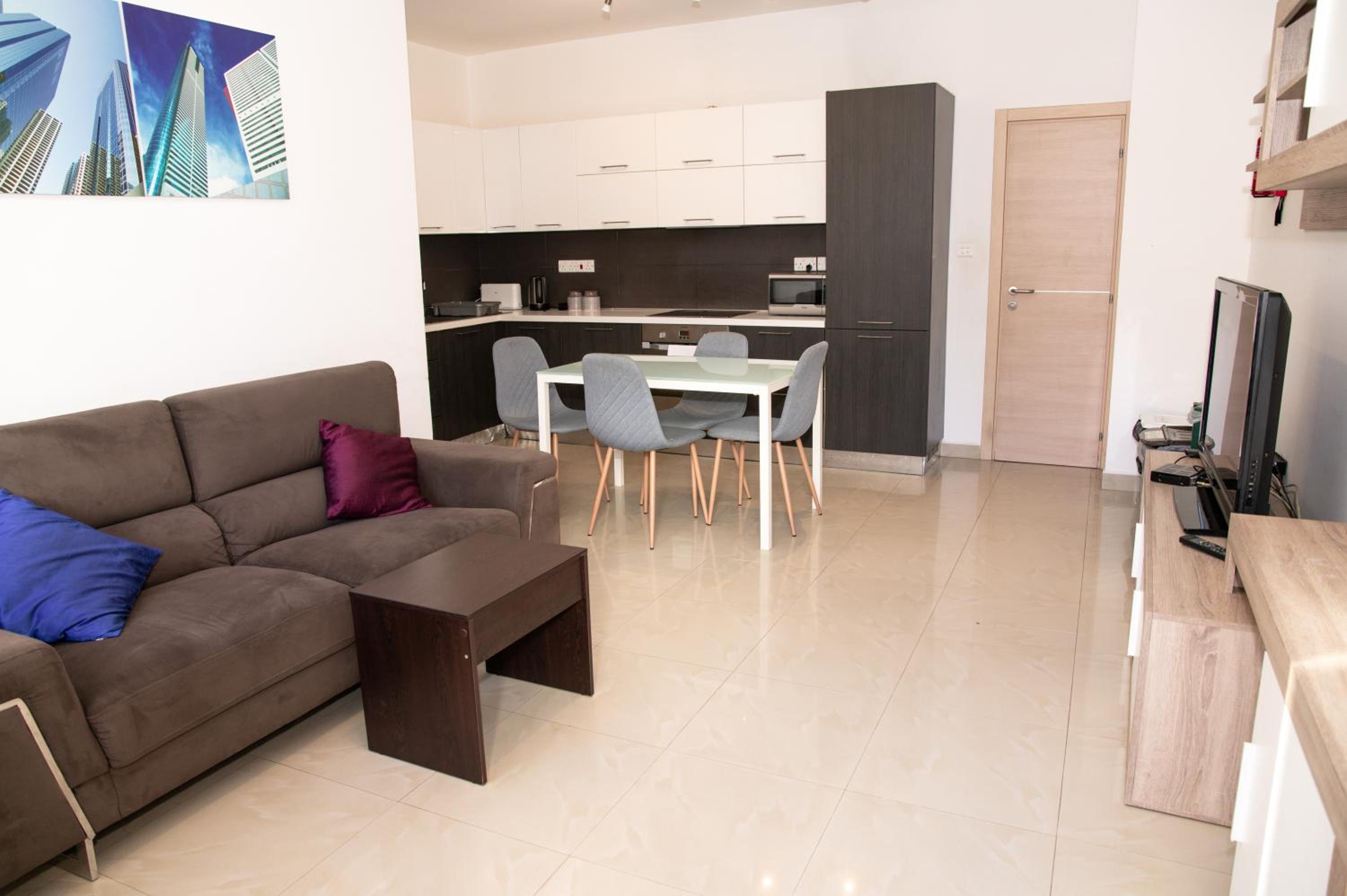 Three-Bedroom Apartment photo 1