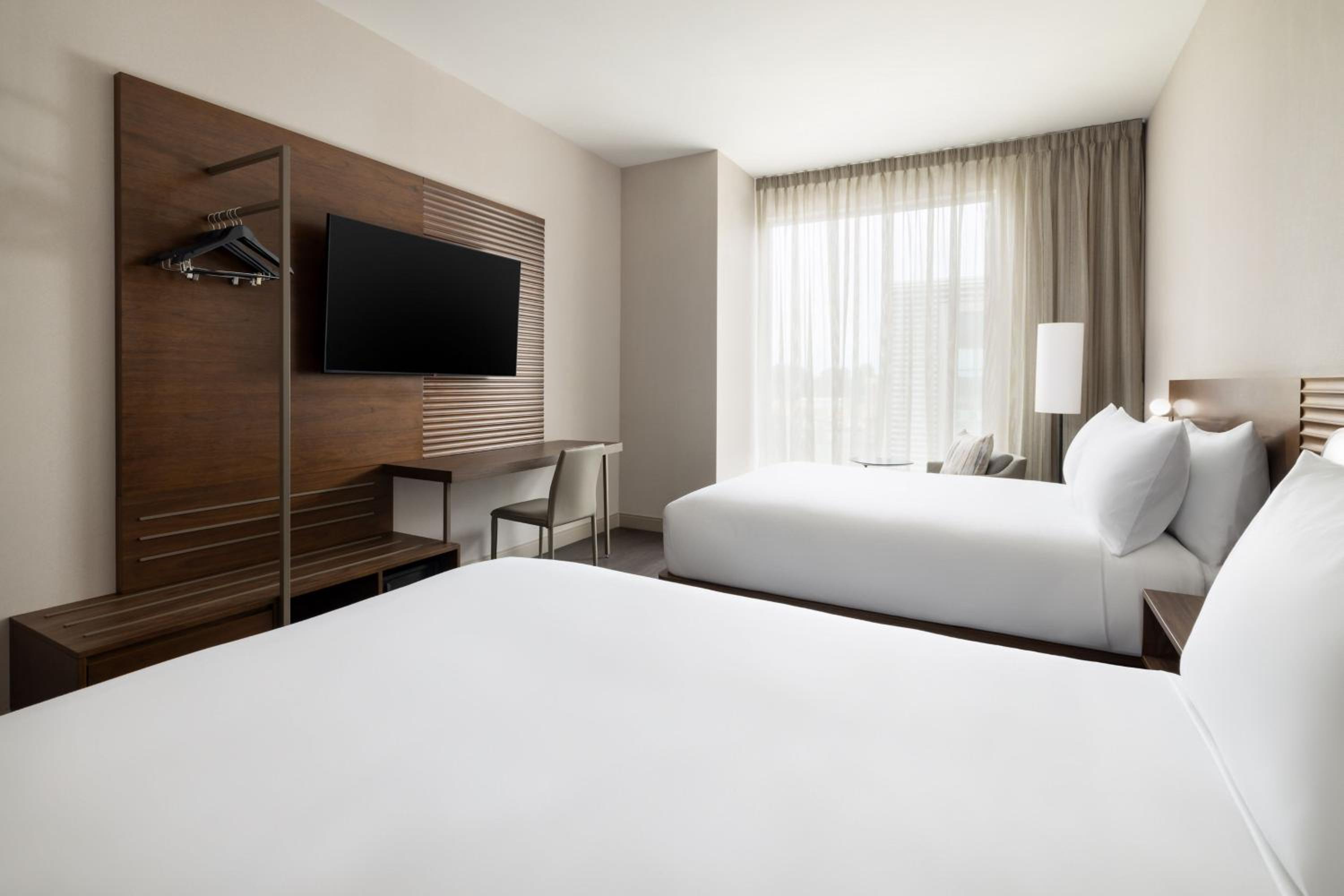 Standard Queen Room with Two Queen Beds - Photo 1