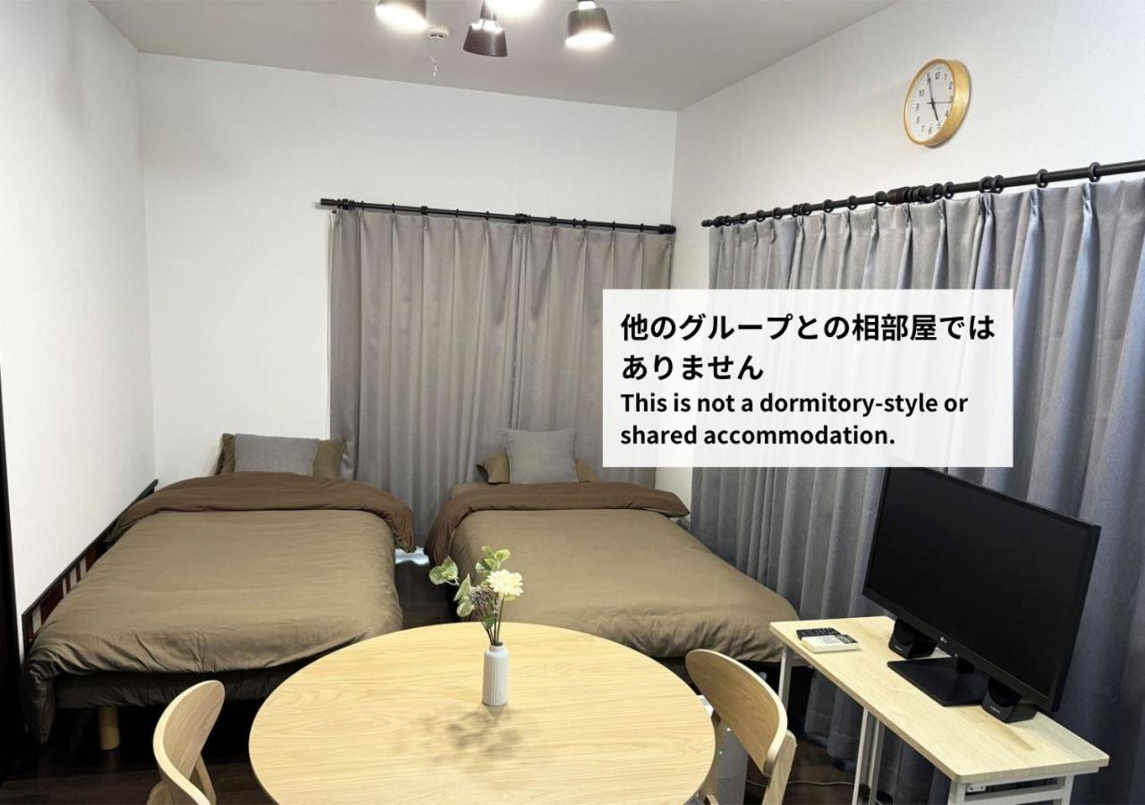 Twin Room with Shared Bathroom photo 1