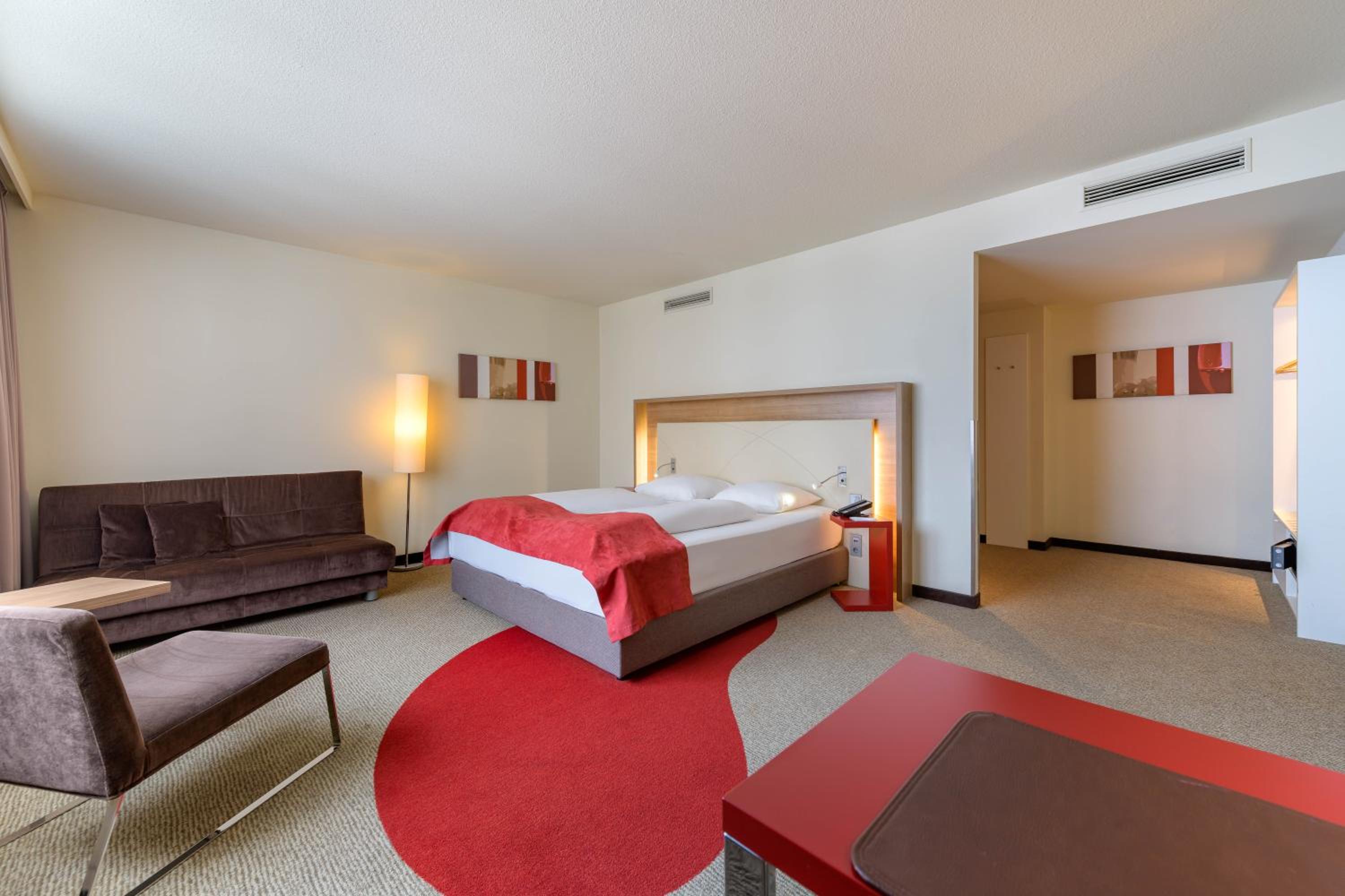 Privilege King Room with Sofa Bed - Photo 1