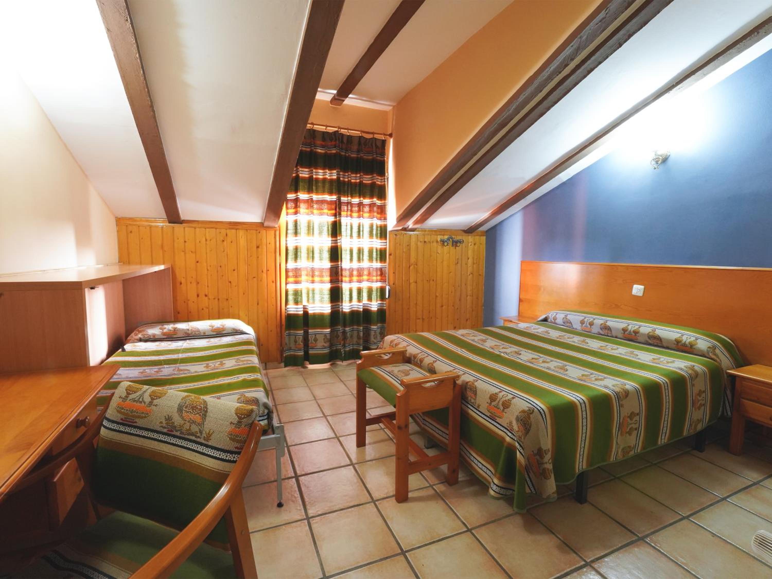 Habitación triple (2 adultos + 1 niño)