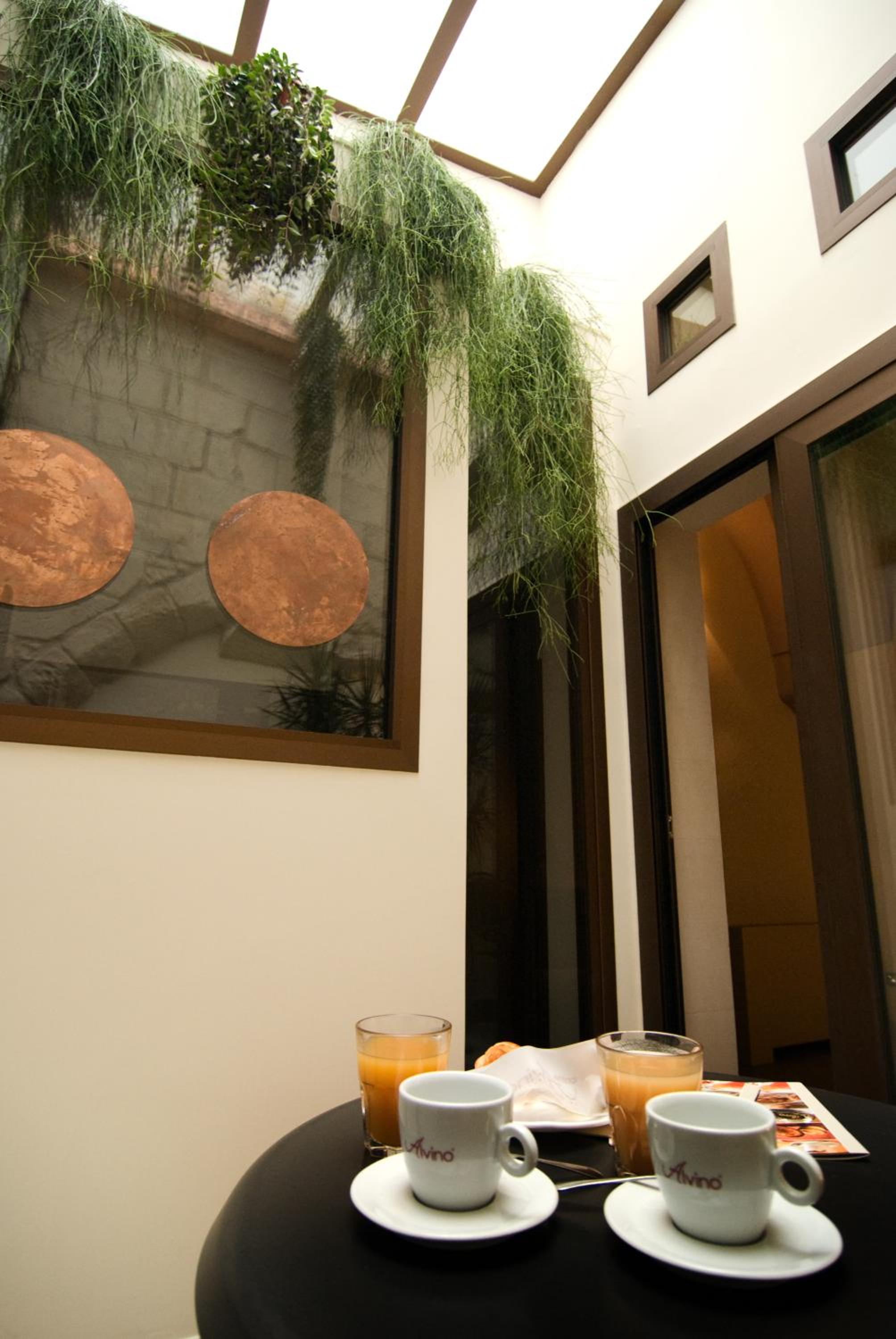 Suite with Ceiling Window - Photo 11