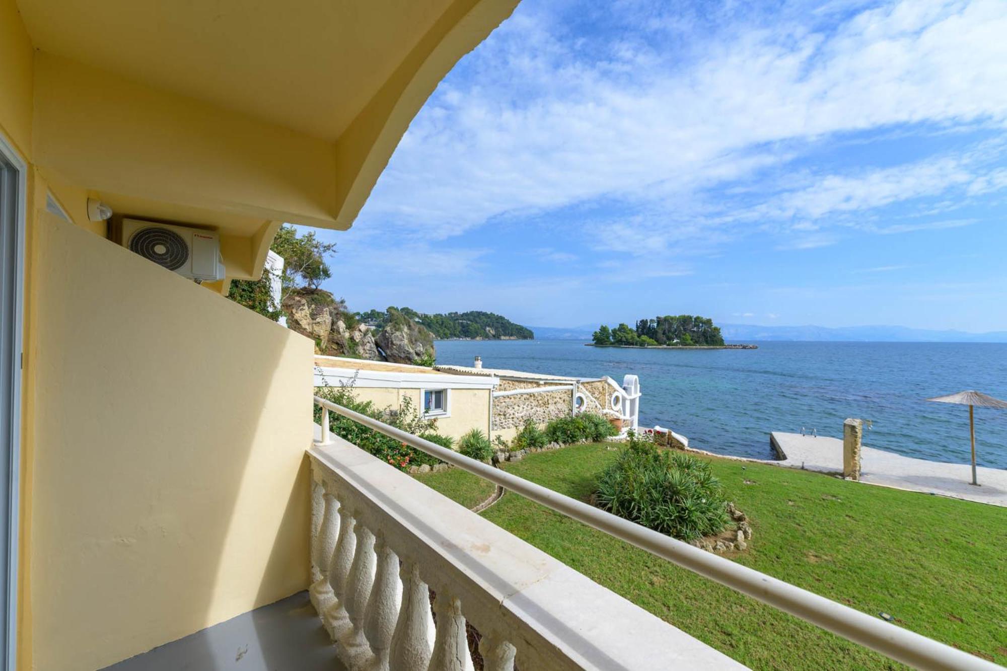 Superior Deluxe Double or Twin Room with Balcony and Pontikonisi island view - Photo 6