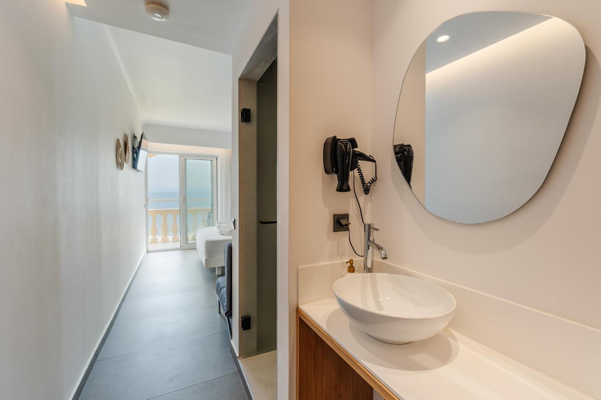 Deluxe Suite with Balcony and Pontikonisi island view
