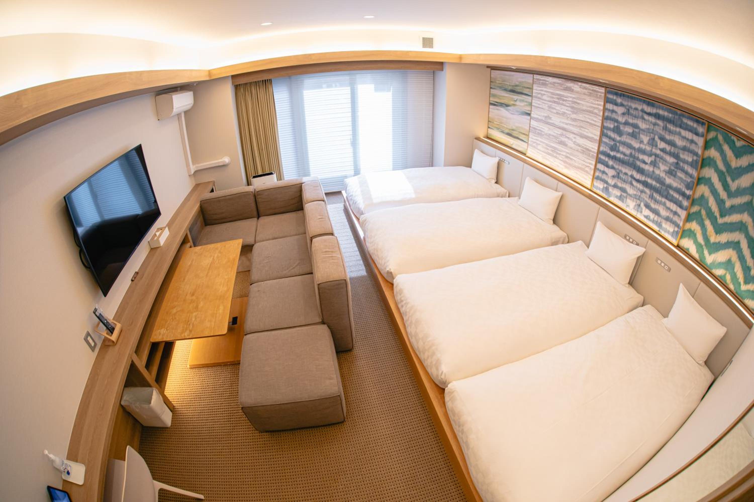 Deluxe Quadruple Room - Photo 19