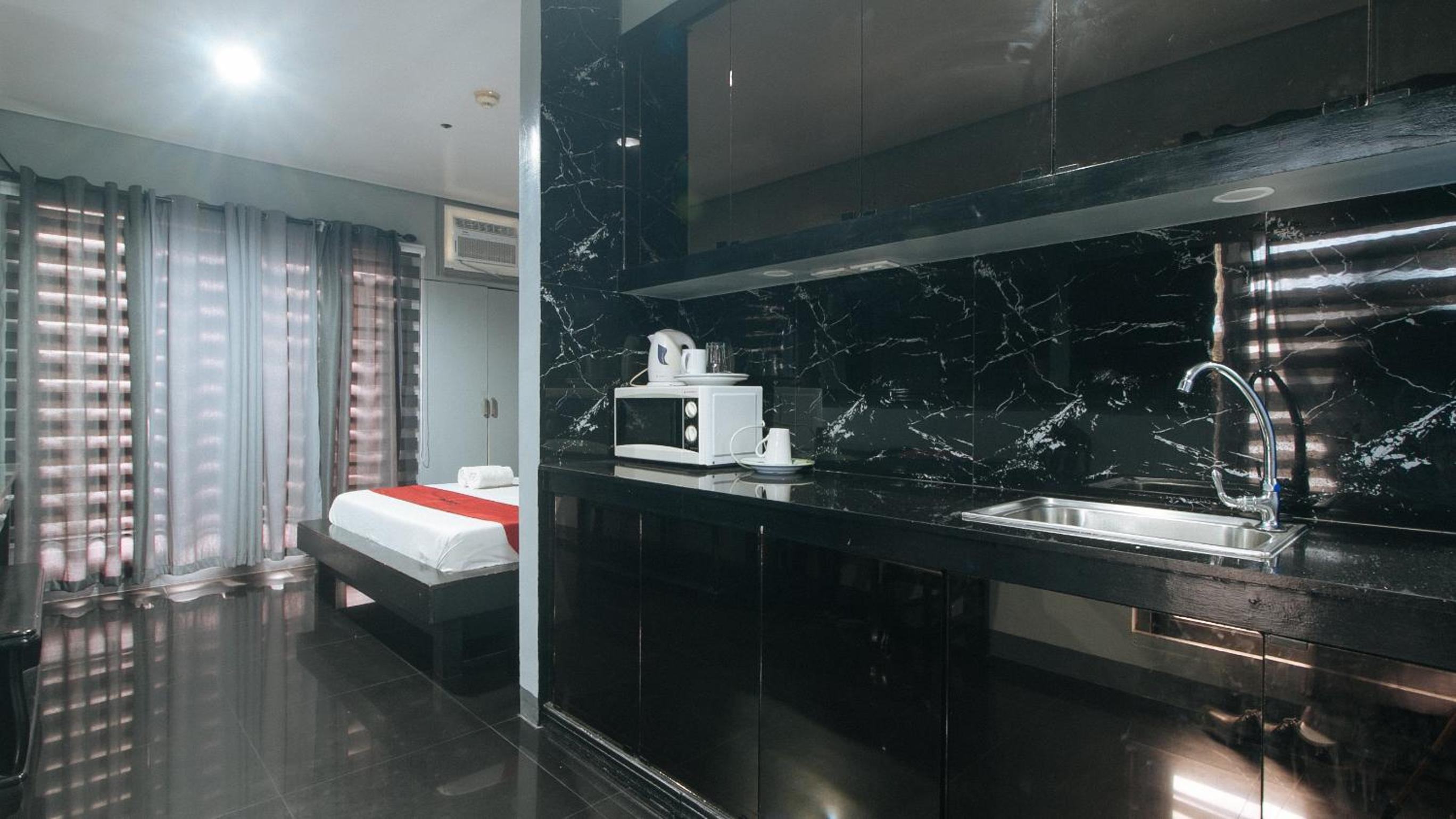 Deluxe Room - Photo 5