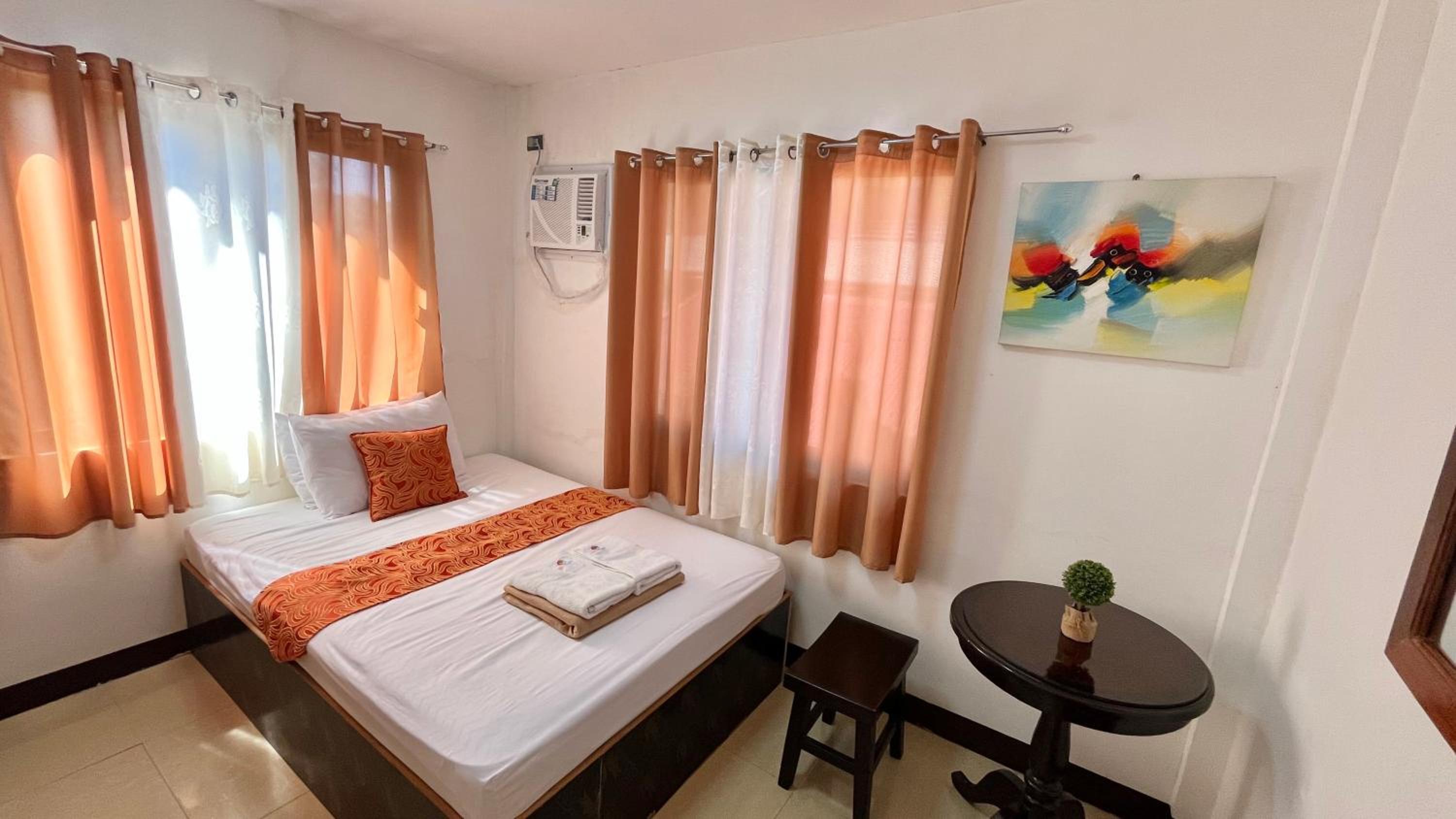 Queen Room with Shared Bathroom