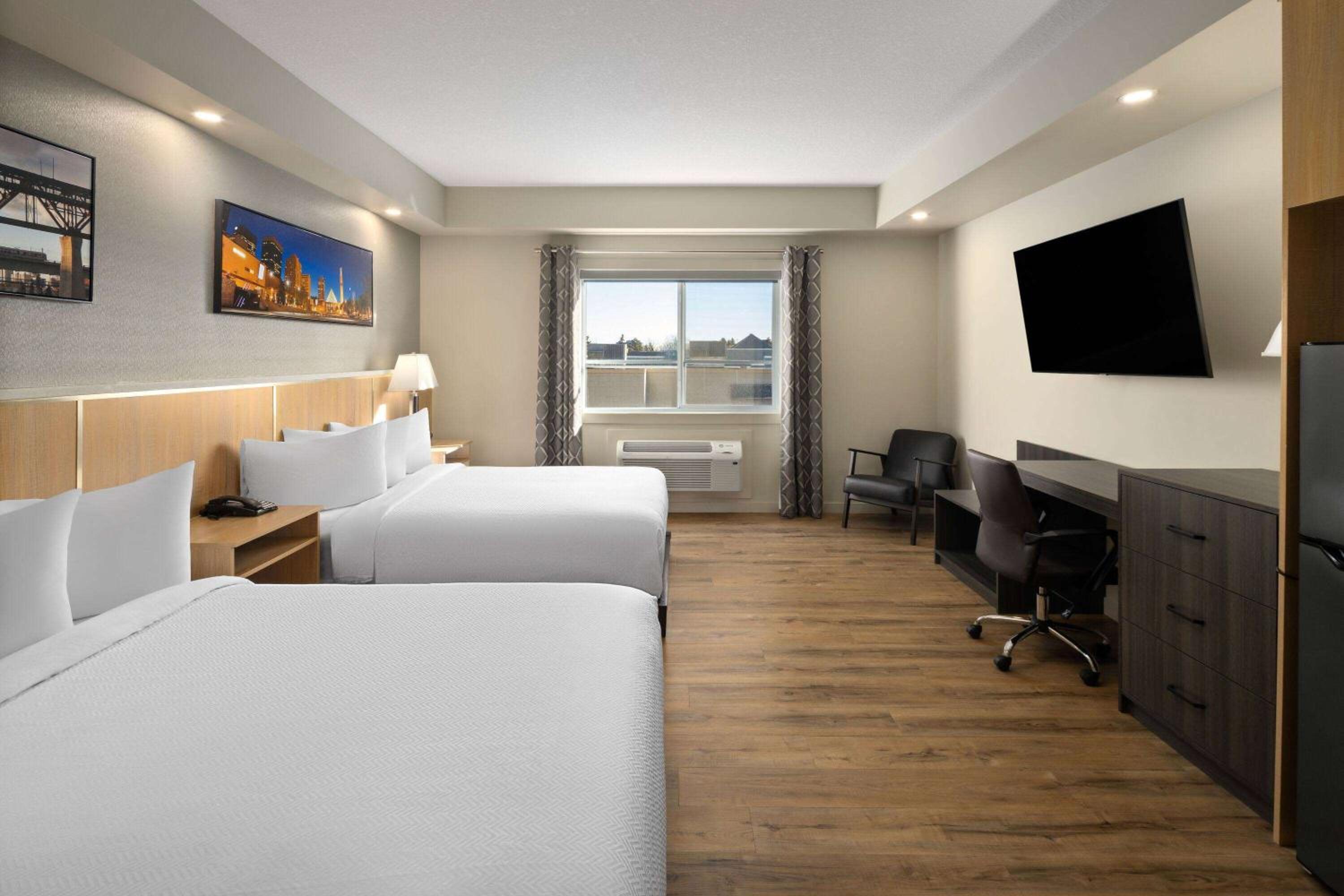 Queen Room with Two Queen Beds, Mobility Access and Roll-In shower, Non-Smoking photo 1