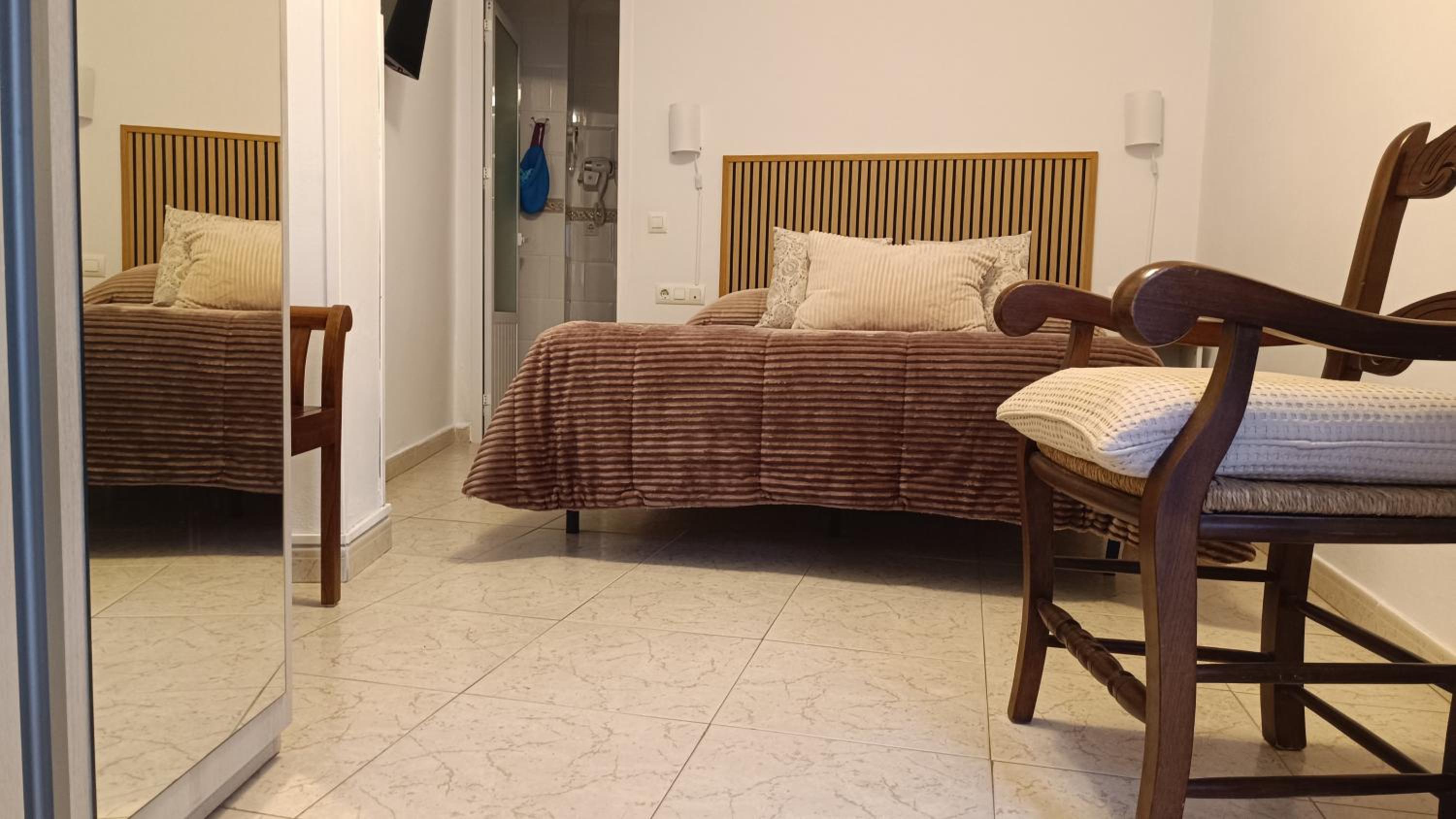 Habitación Estándar con Cama Queen