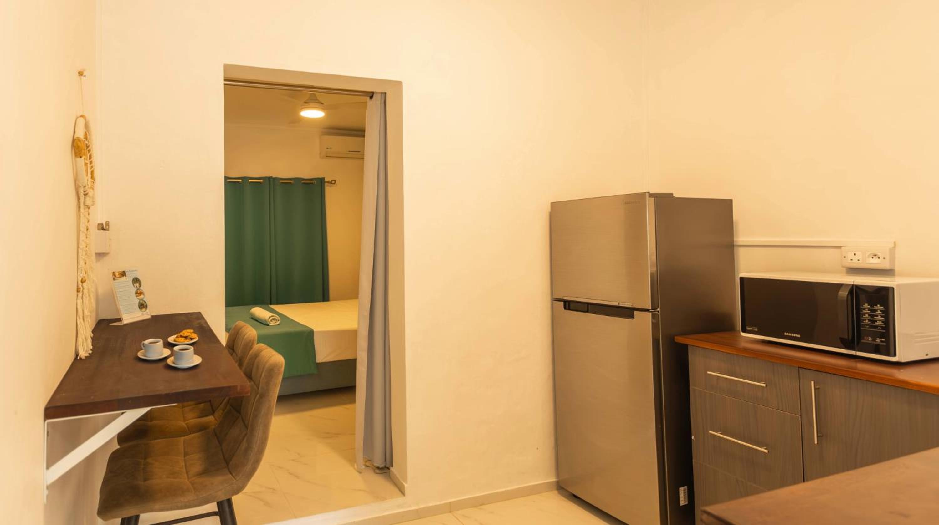 Quadruple Room with Garden View - Photo 10