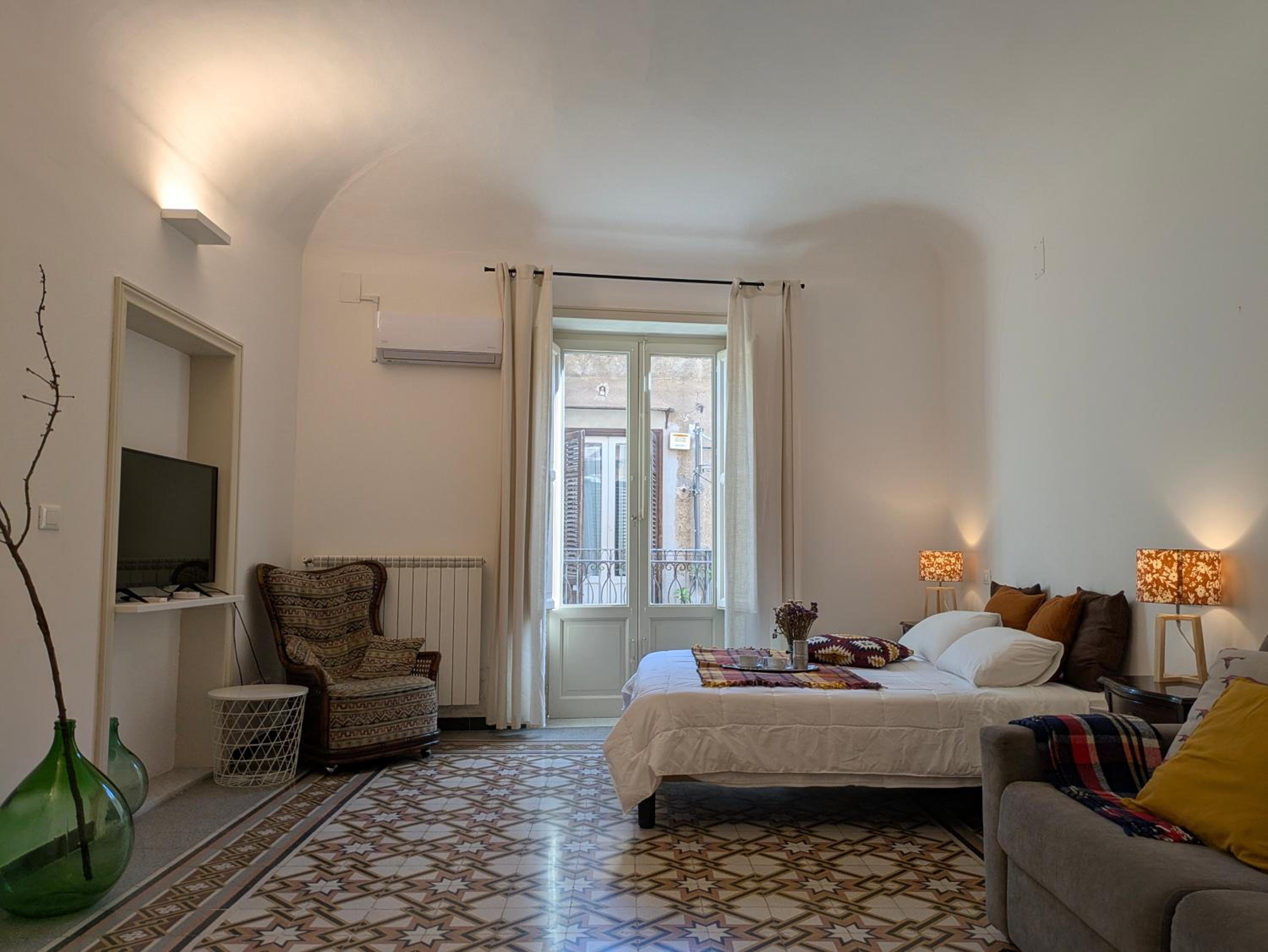 Quadruple Room with Private Bathroom