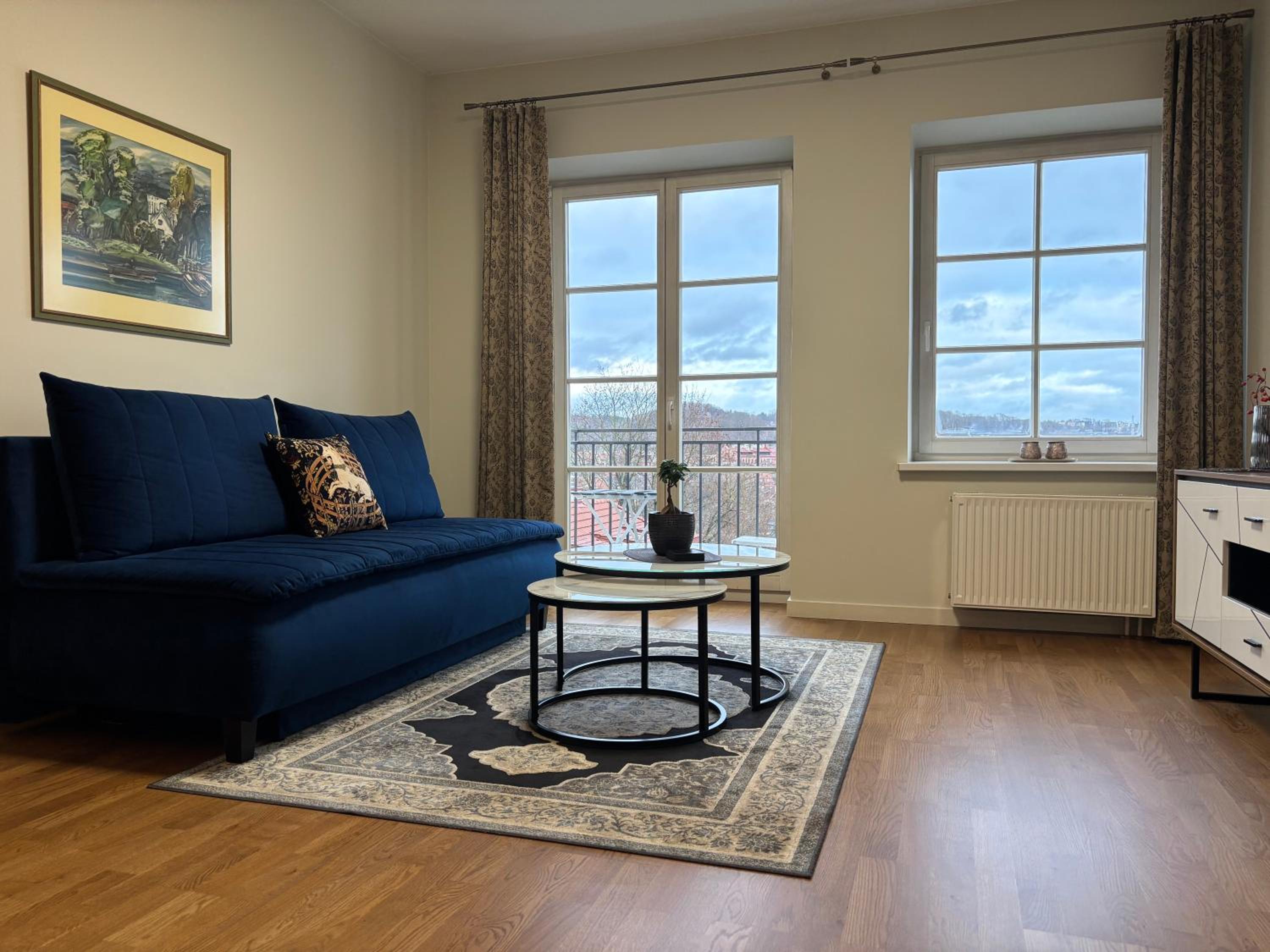 One-Bedroom Apartment with Balcony and City View