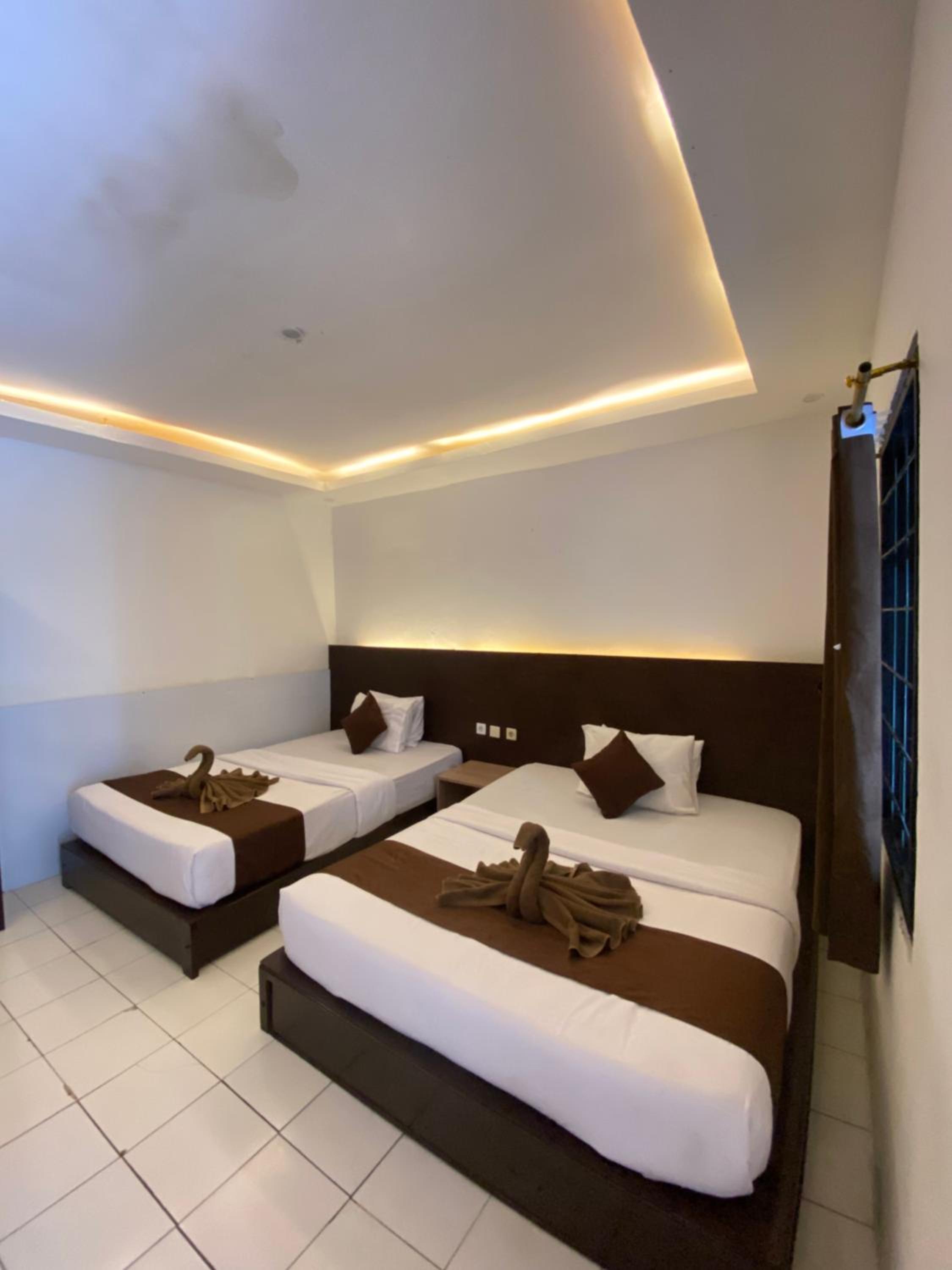 Standard Twin Room - Photo 1