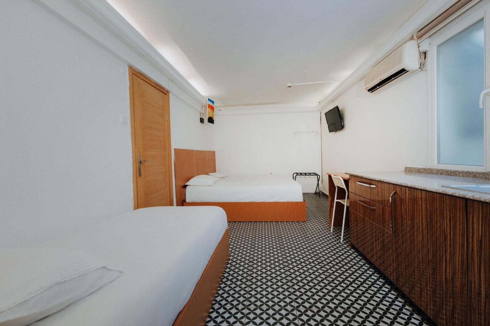 Standard Twin Room - Photo 3