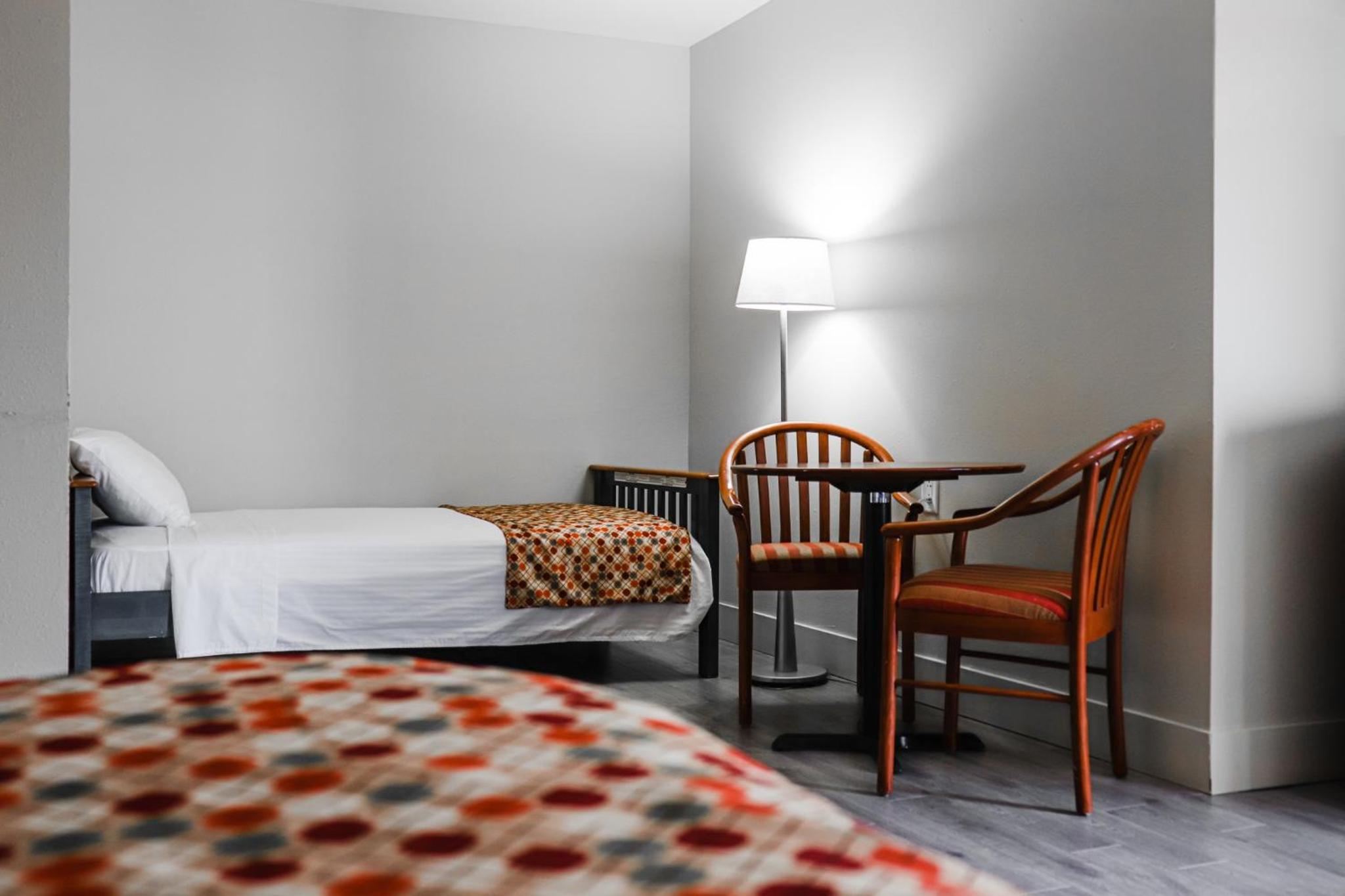 Queen Room with Two Queen Beds - Non-Smoking - Photo 1