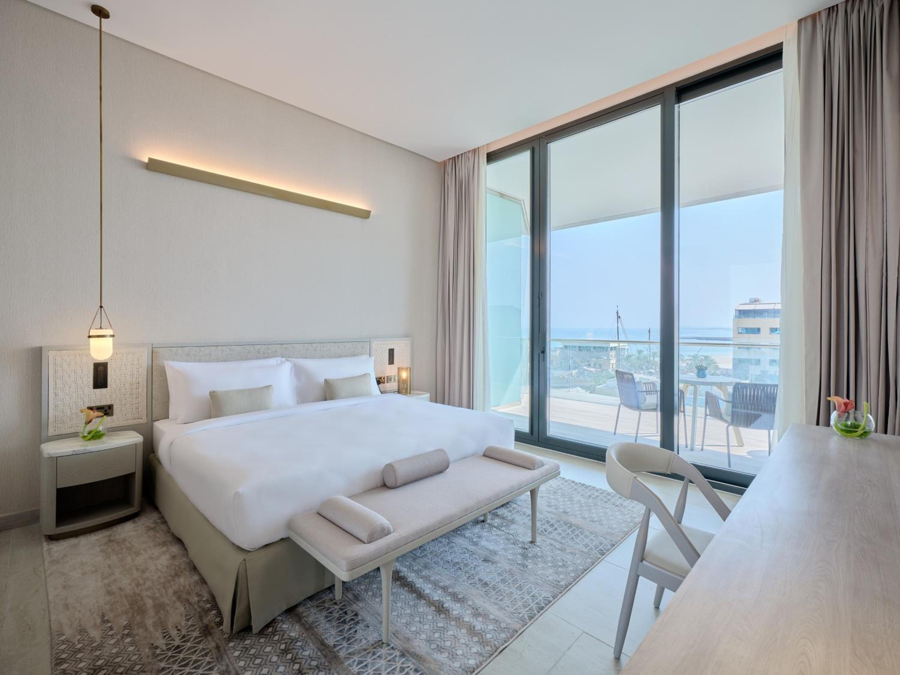 One-Bedroom Suite with Balcony - Furnished - Photo 8