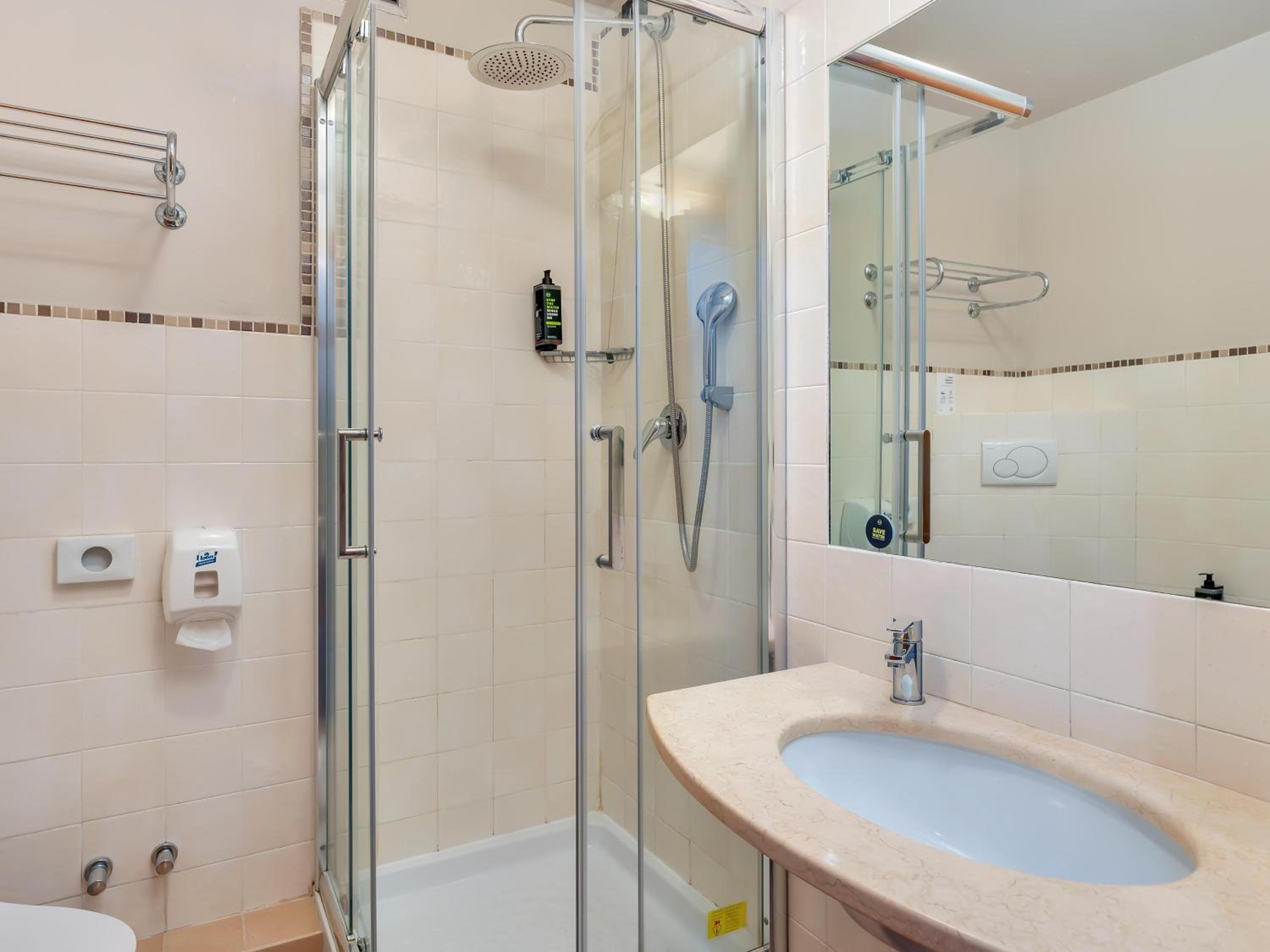 Refresh and unwind in this elegant shower space.