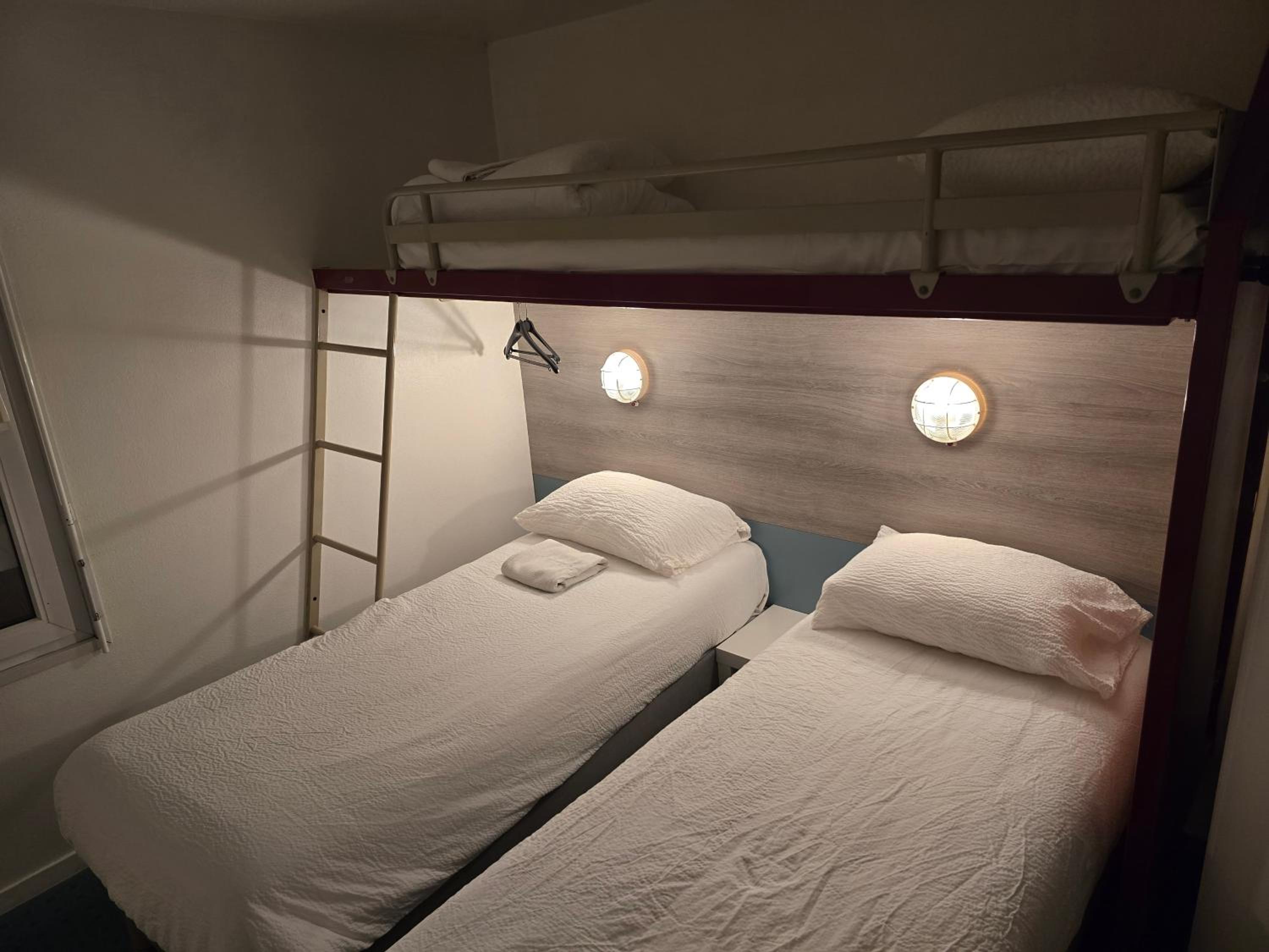 Triple Room (2 single bed + 1 Bunk Bed)