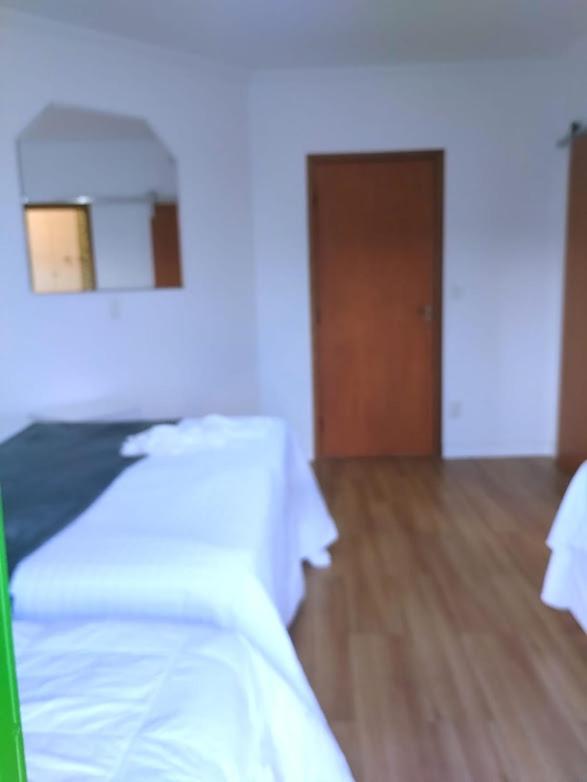 Economy Quadruple Room With Shared Bathroom photo 3