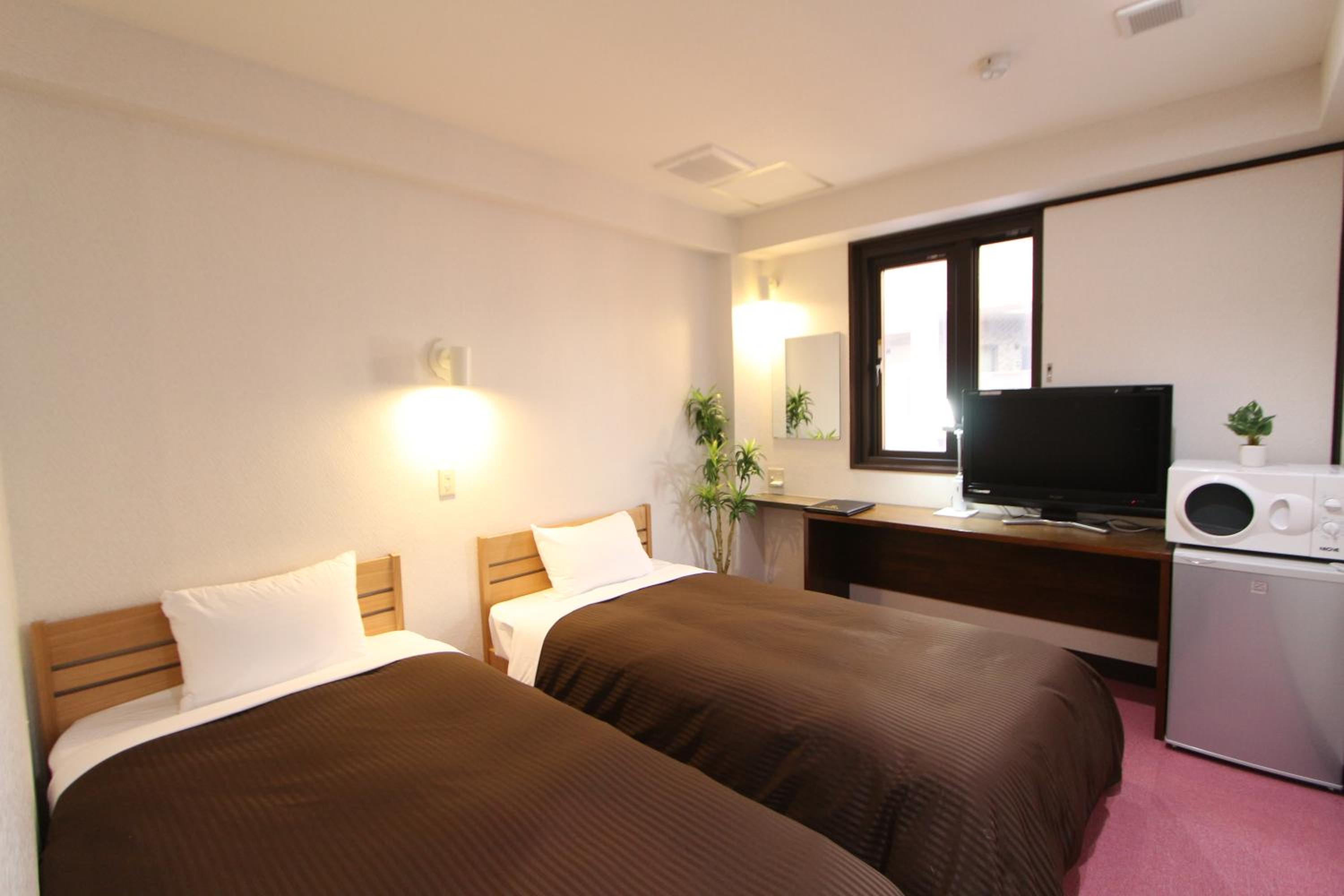 Twin Room - Non-Smoking - Photo 1