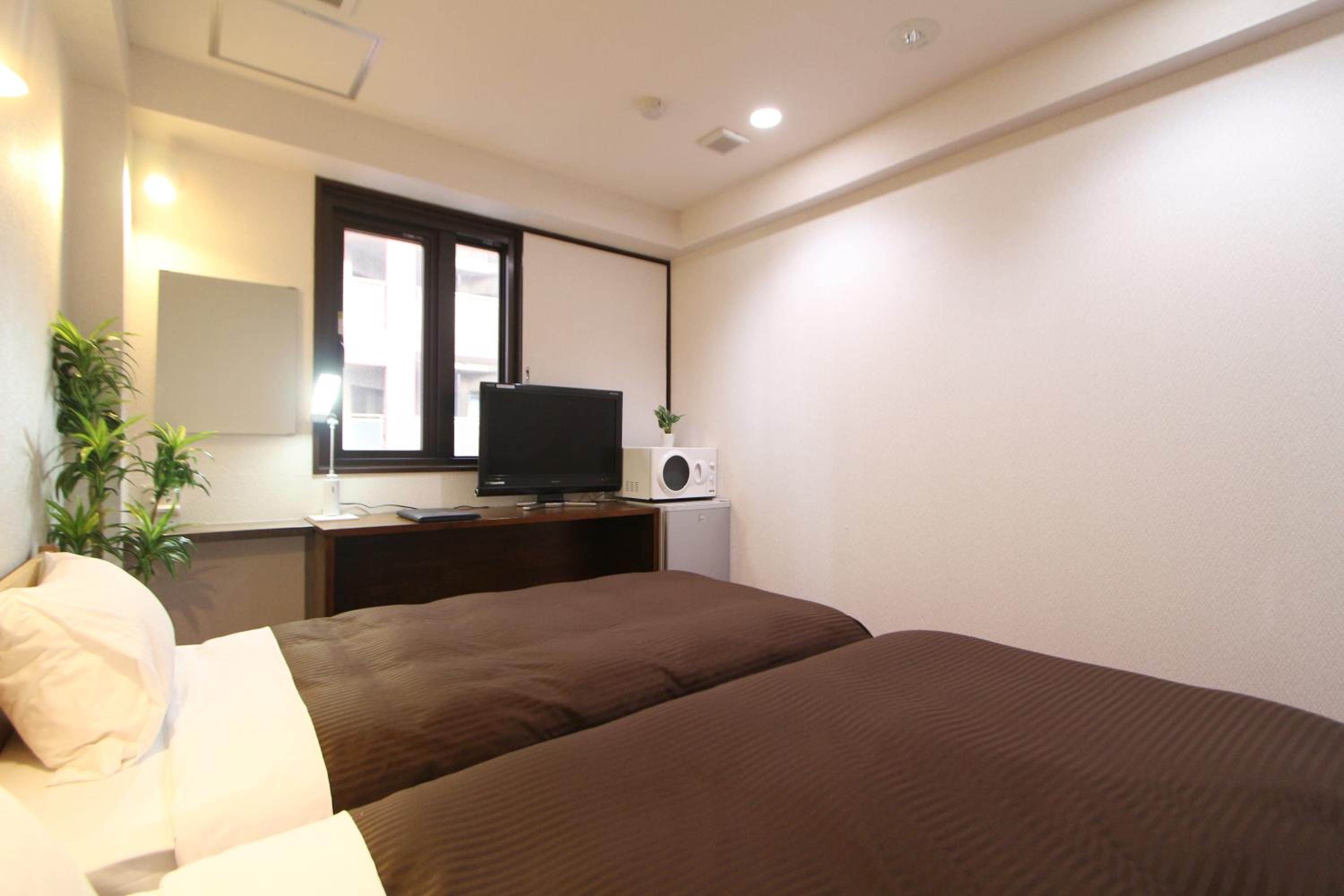 Twin Room - Non-Smoking - Photo 3
