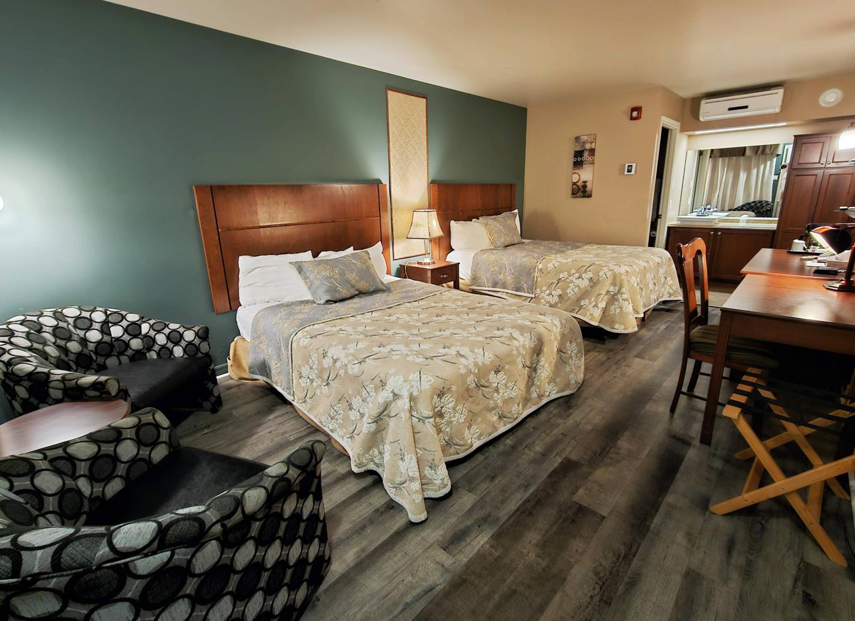 Superior Queen Room with Two Queen Beds - Photo 1