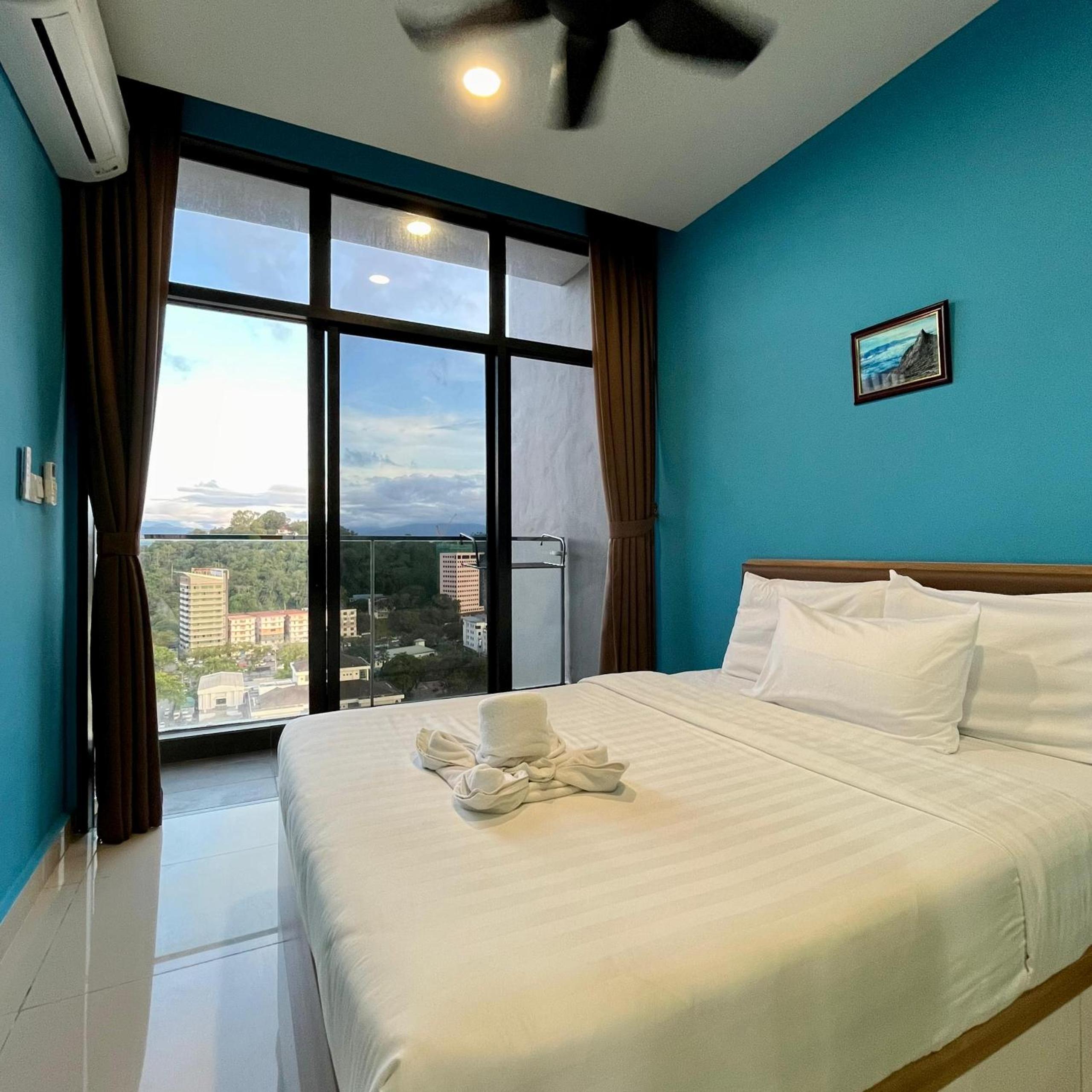 One-Bedroom Apartment with Balcony and City View
