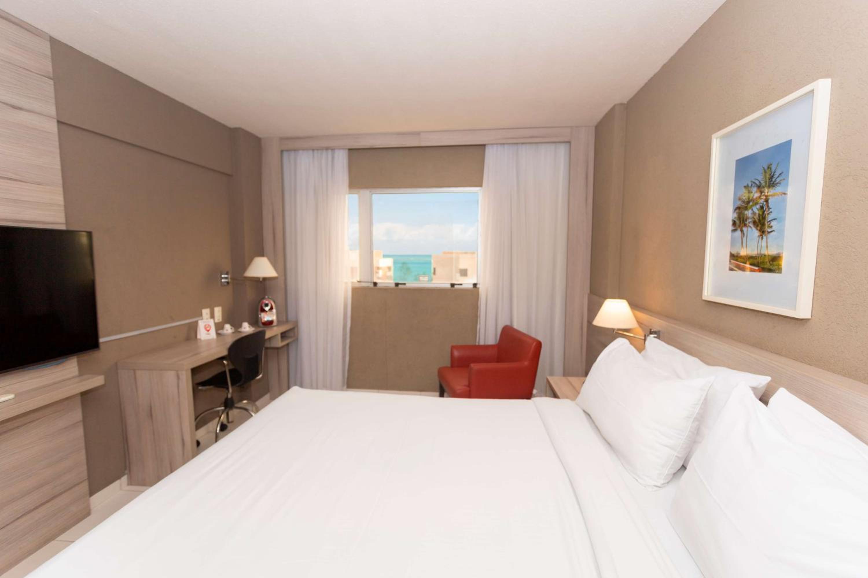 King Room with Partial Ocean View - Photo 1