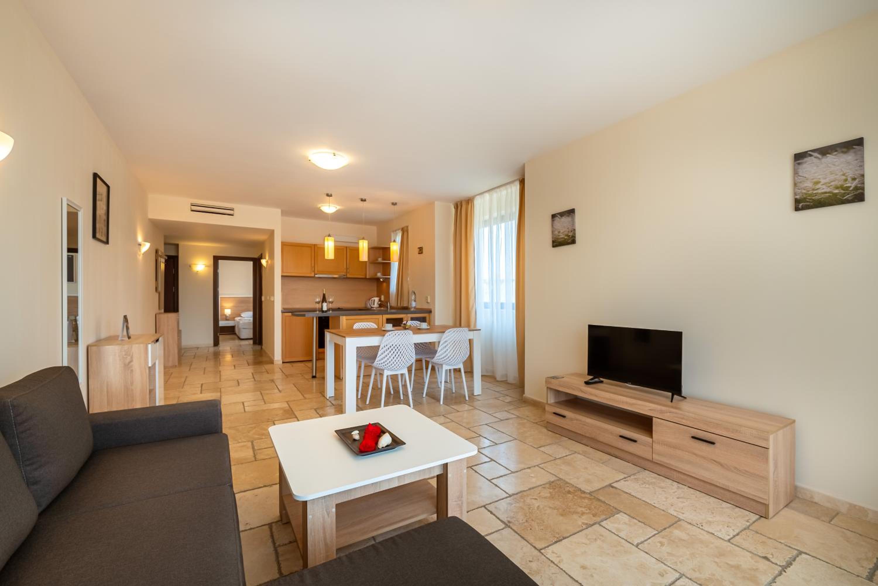 One-Bedroom Apartment with Balcony and Pool View