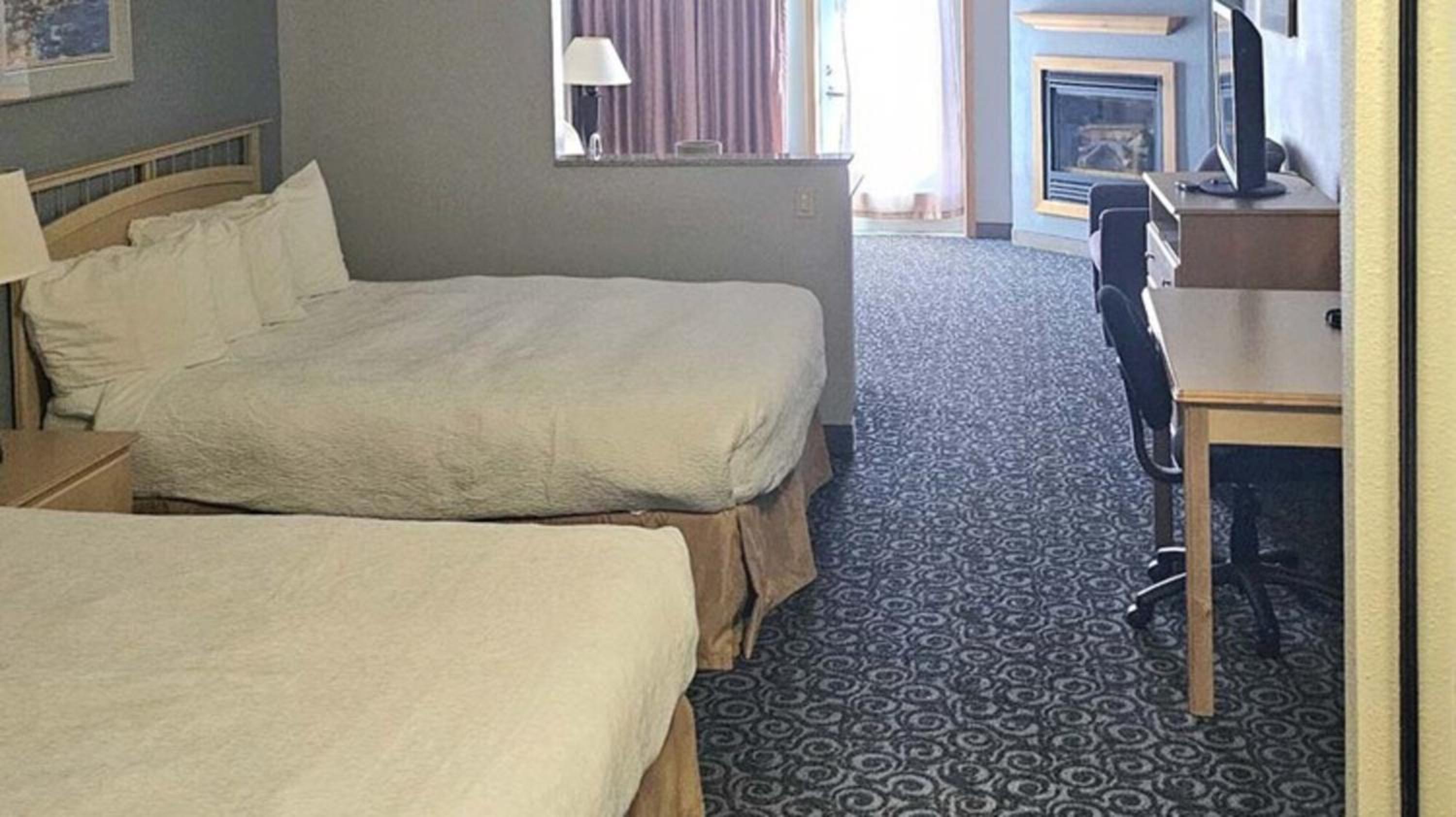 Two Queen Beds with Partial Ocean View