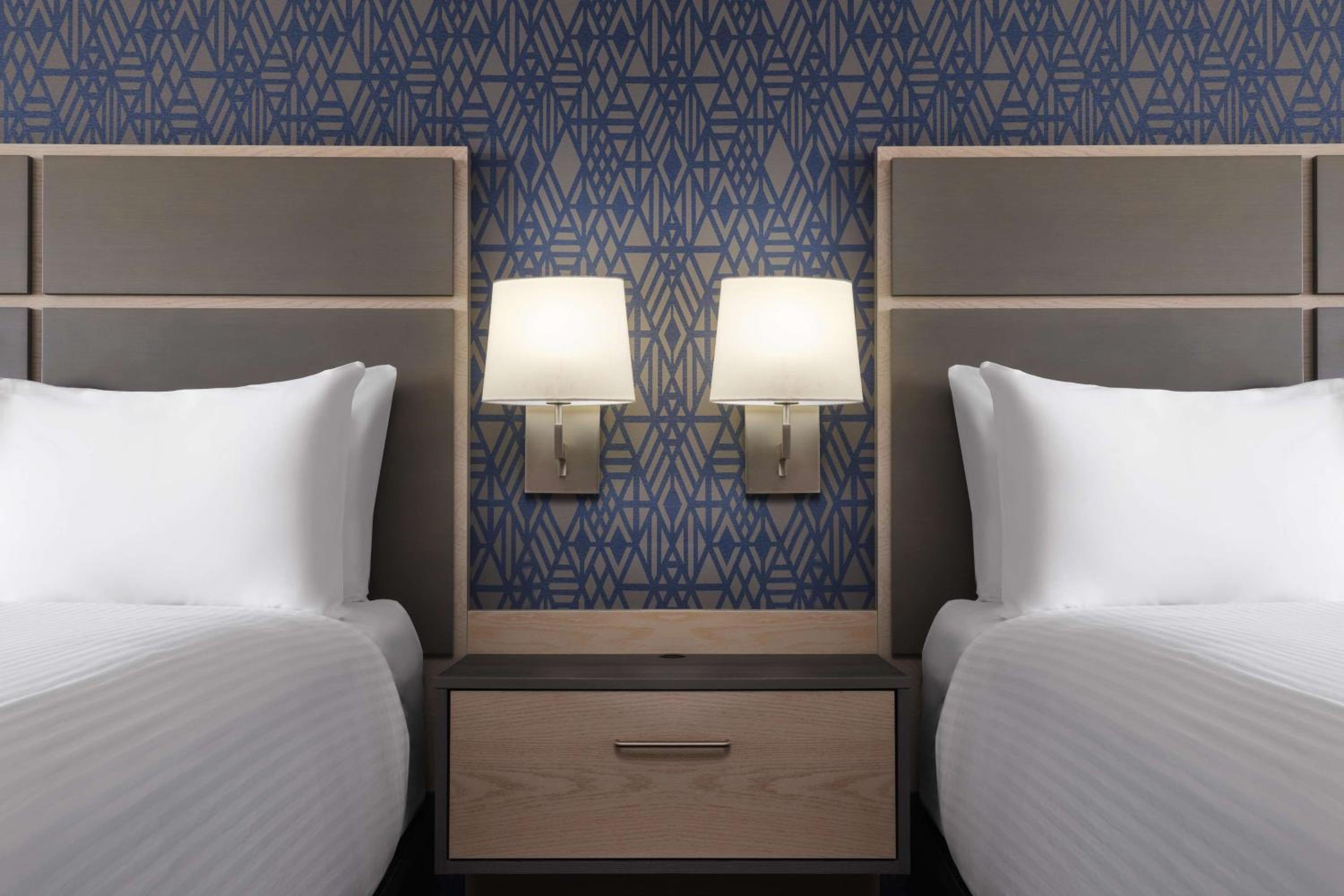 Queen Room with Two Queen Beds - Photo 1