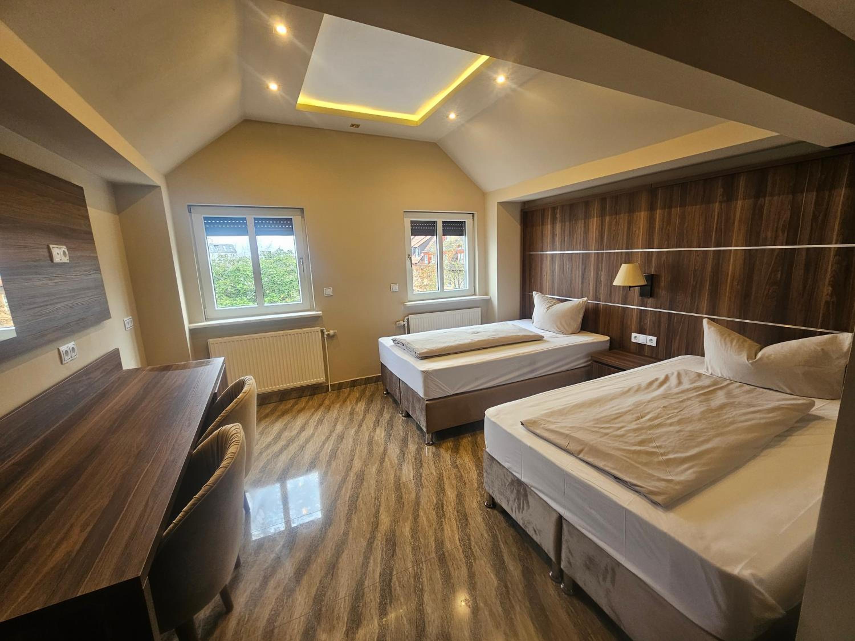 Comfort Triple Room with Shower - Photo 1