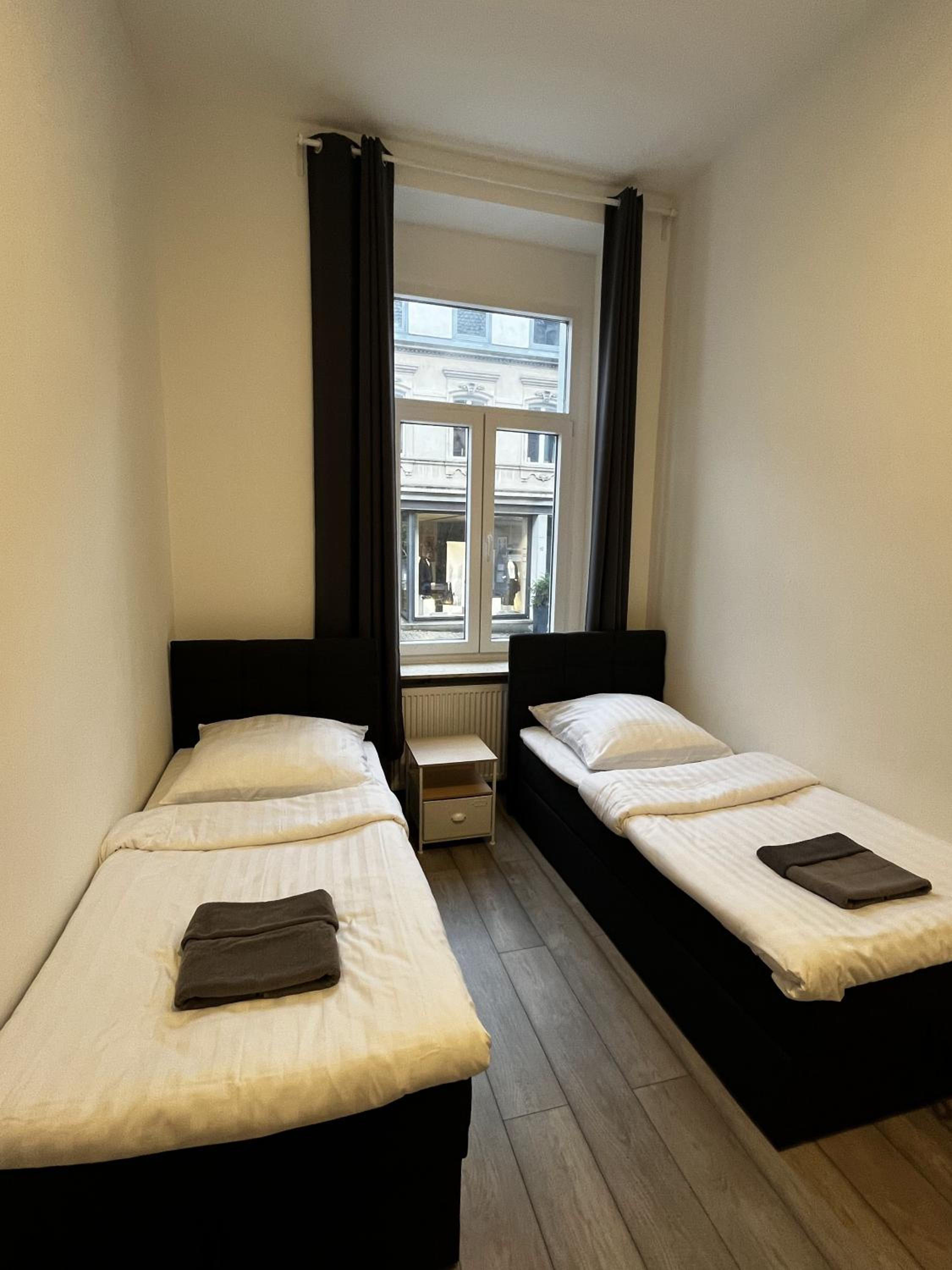 Three-Bedroom Apartment With Balcony photo 2