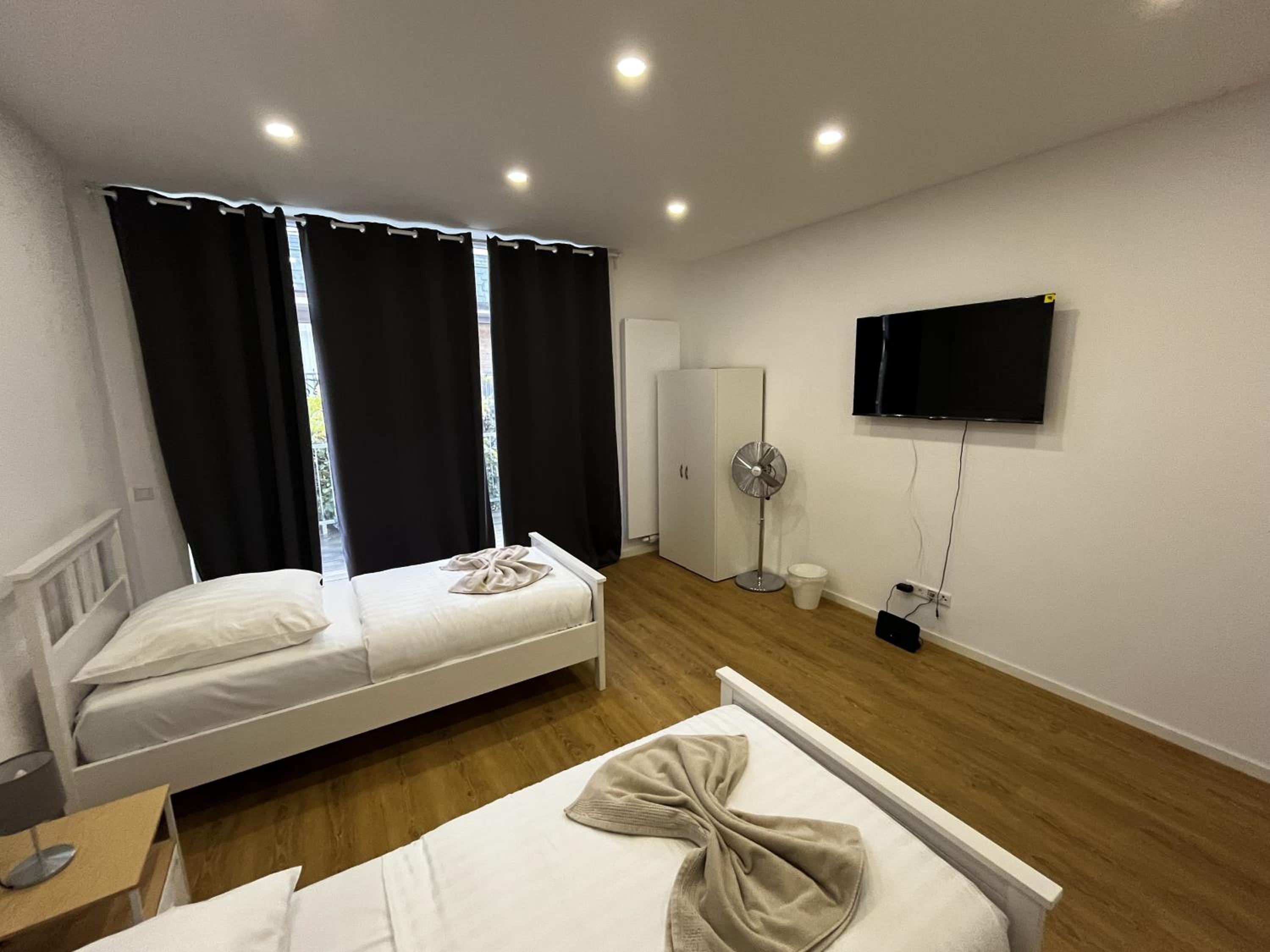 Four-Bedroom Apartment With Balcony  photo 1