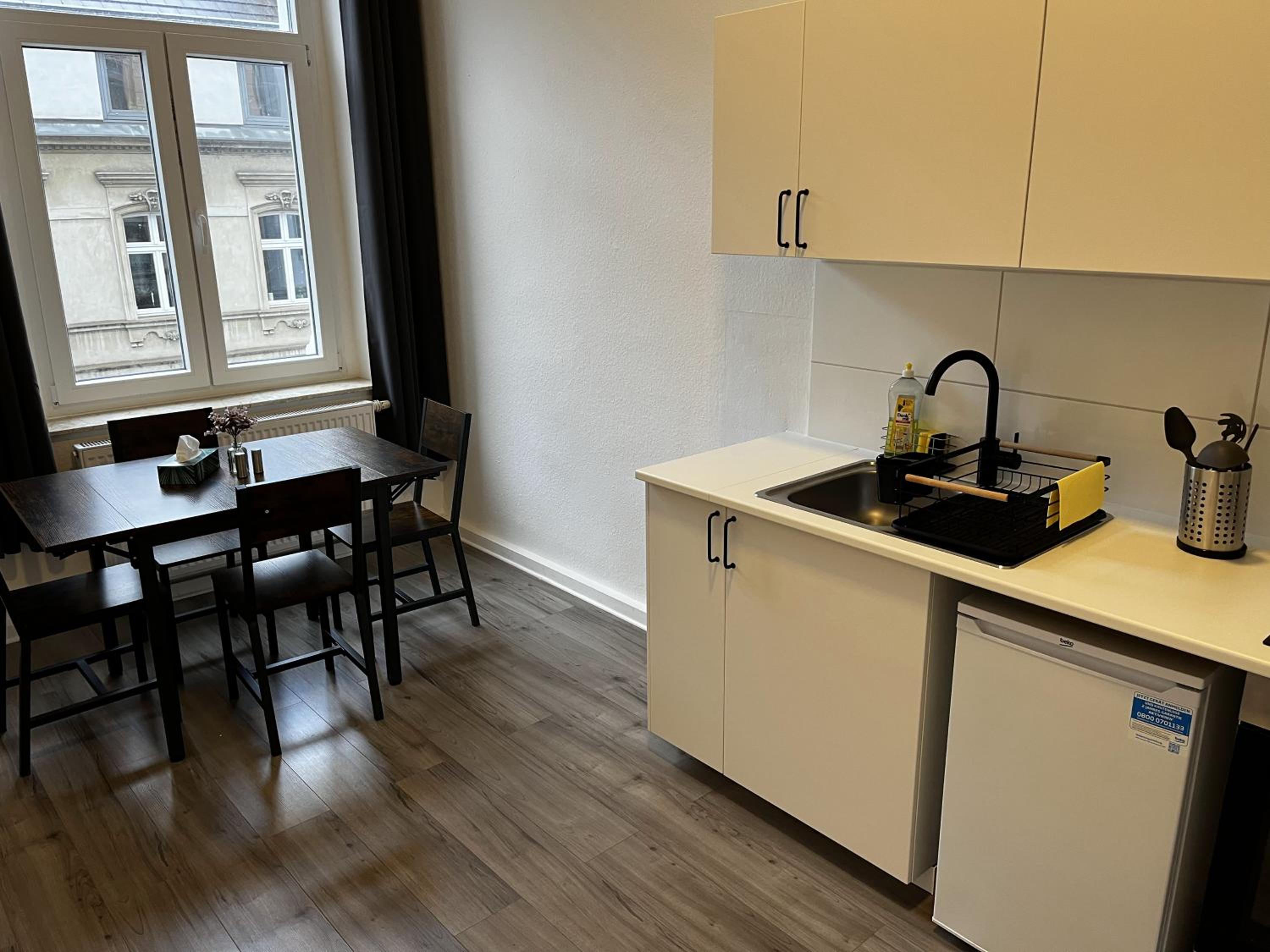 Three-Bedroom Apartment photo 2
