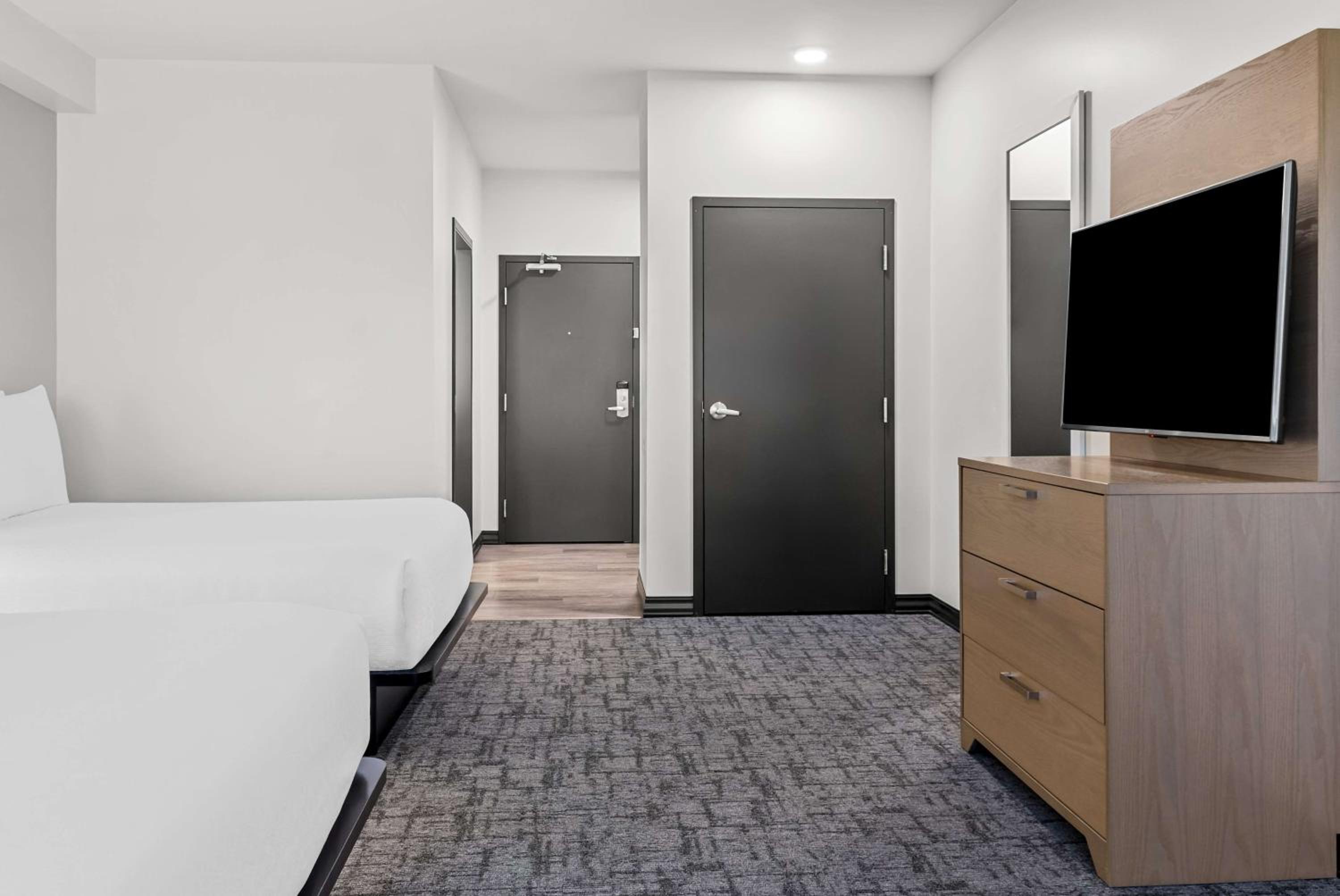 Queen Suite with Two Queen Beds with Sofa Bed - Photo 1