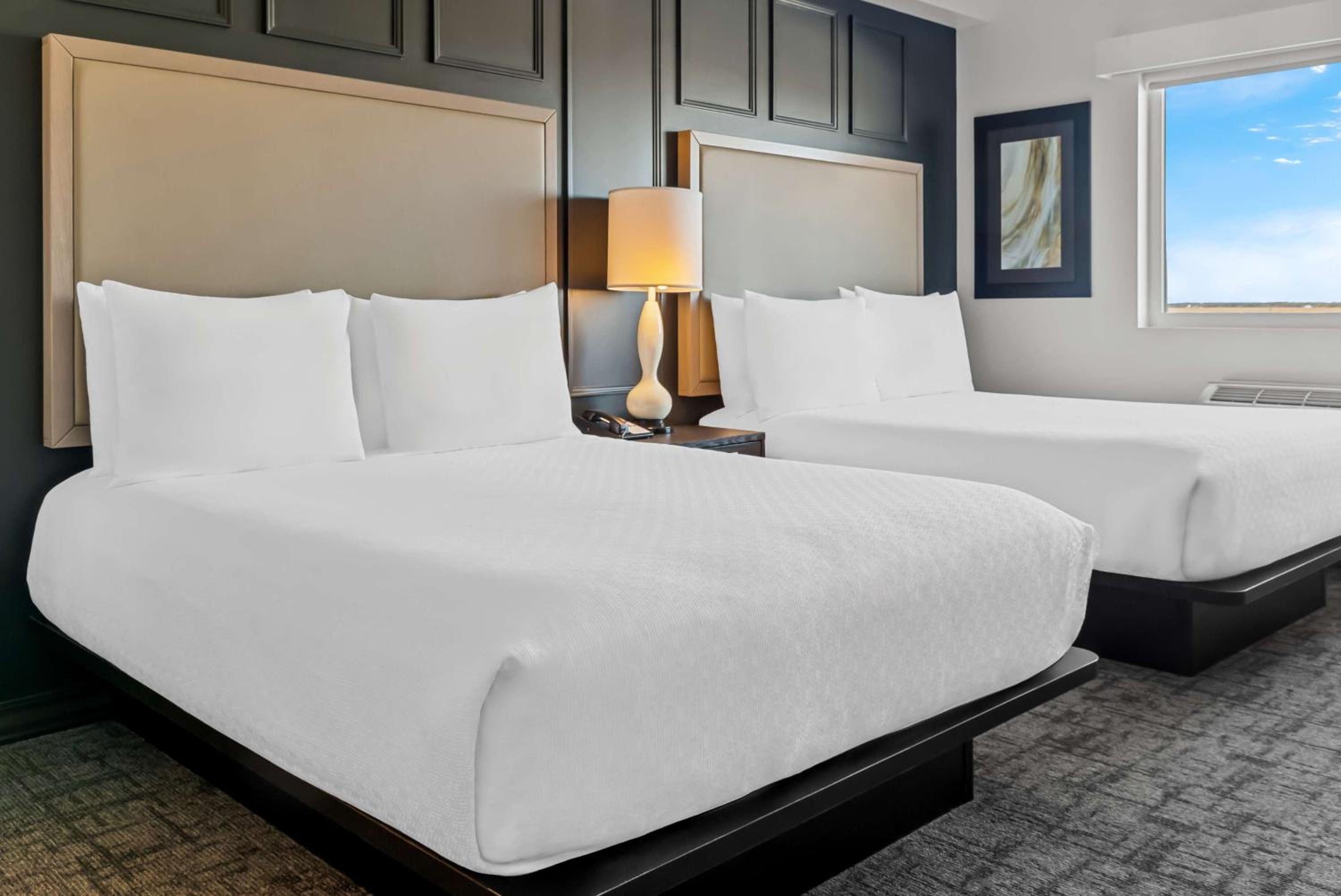 Queen Suite with Three Queen Beds and Sofa Bed - Non-Smoking - Photo 5