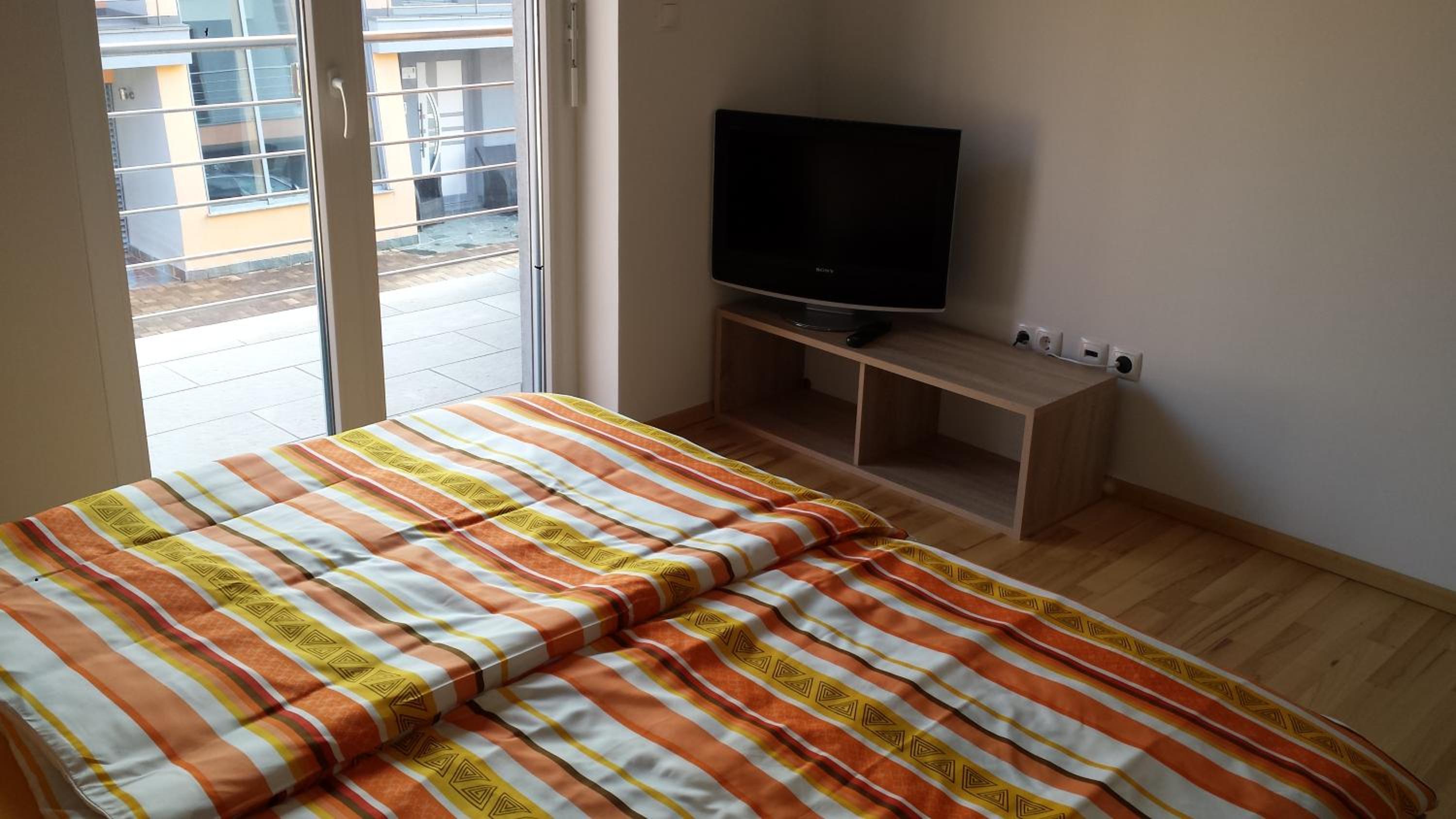 Three-Bedroom Apartment - Photo 12