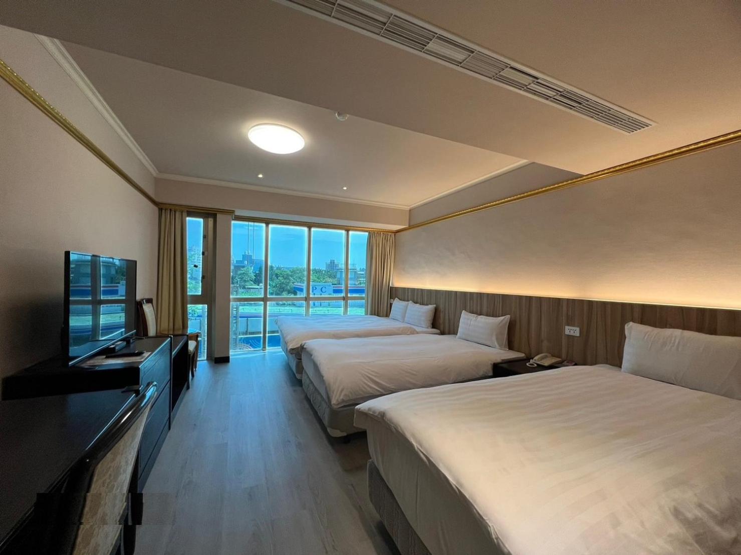 Standard Quadruple Room - Photo 8