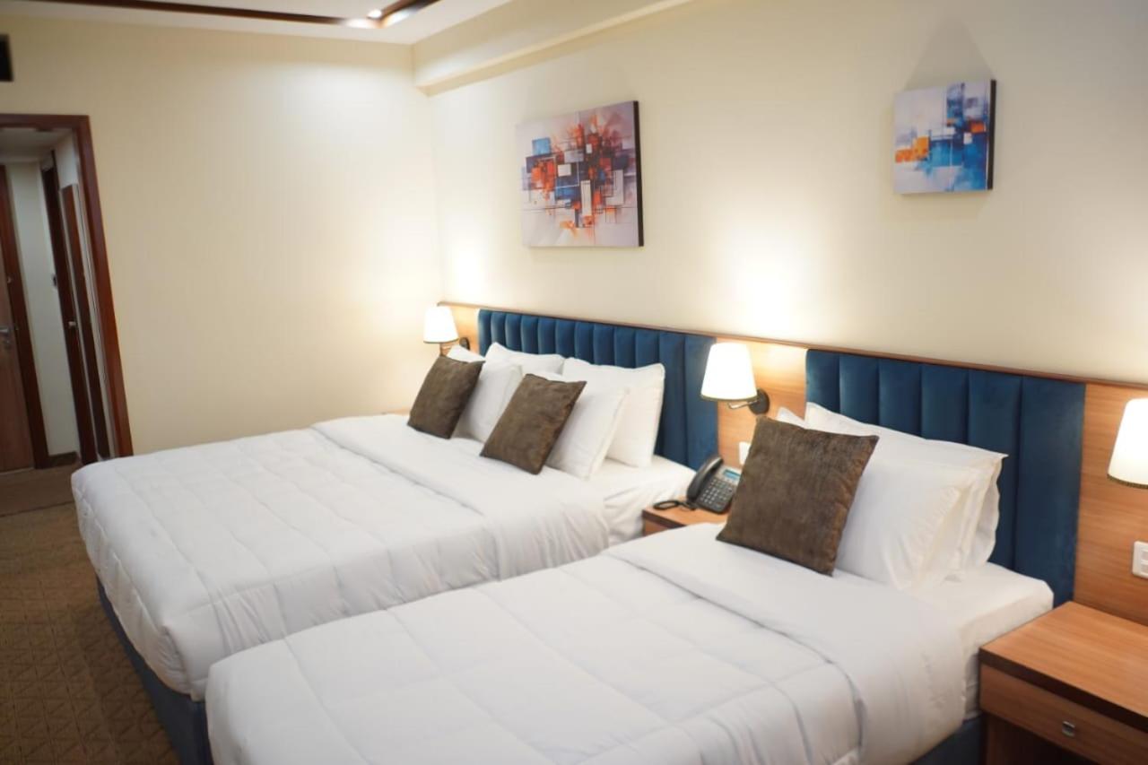 Deluxe Triple Room - Photo 1