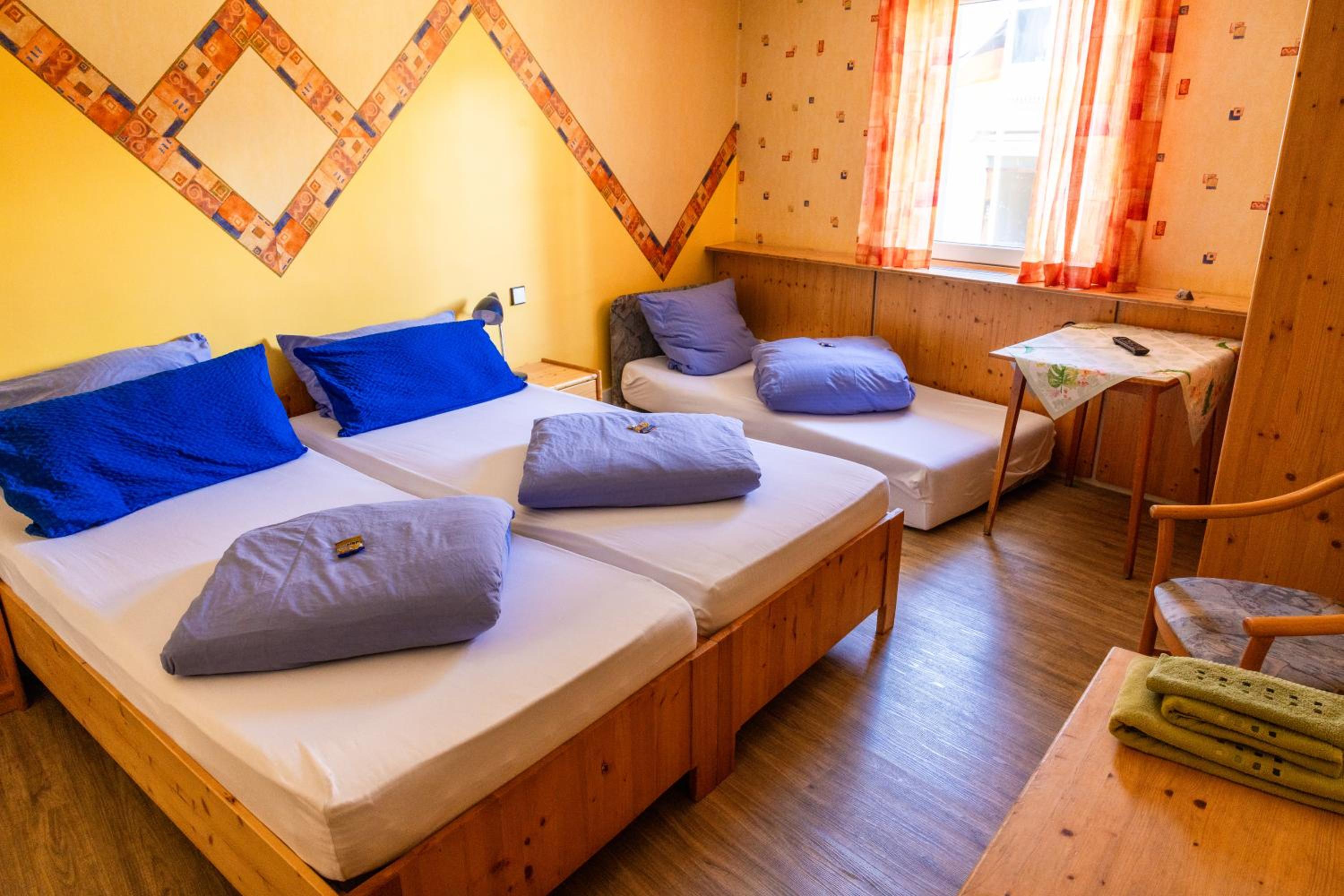 Standard Double Room with two extra beds photo 3