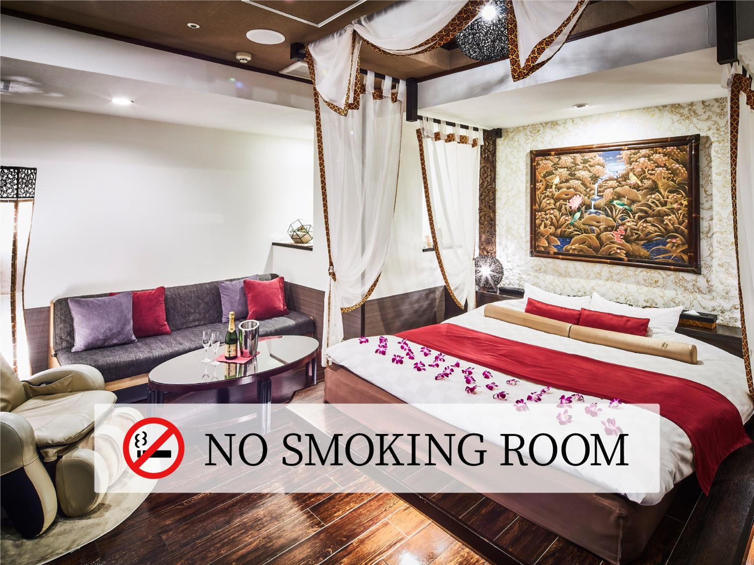 Deluxe Canopy Room | King Bed, Large Blower Bath & Massage Chair - Non-Smoking - Photo 1