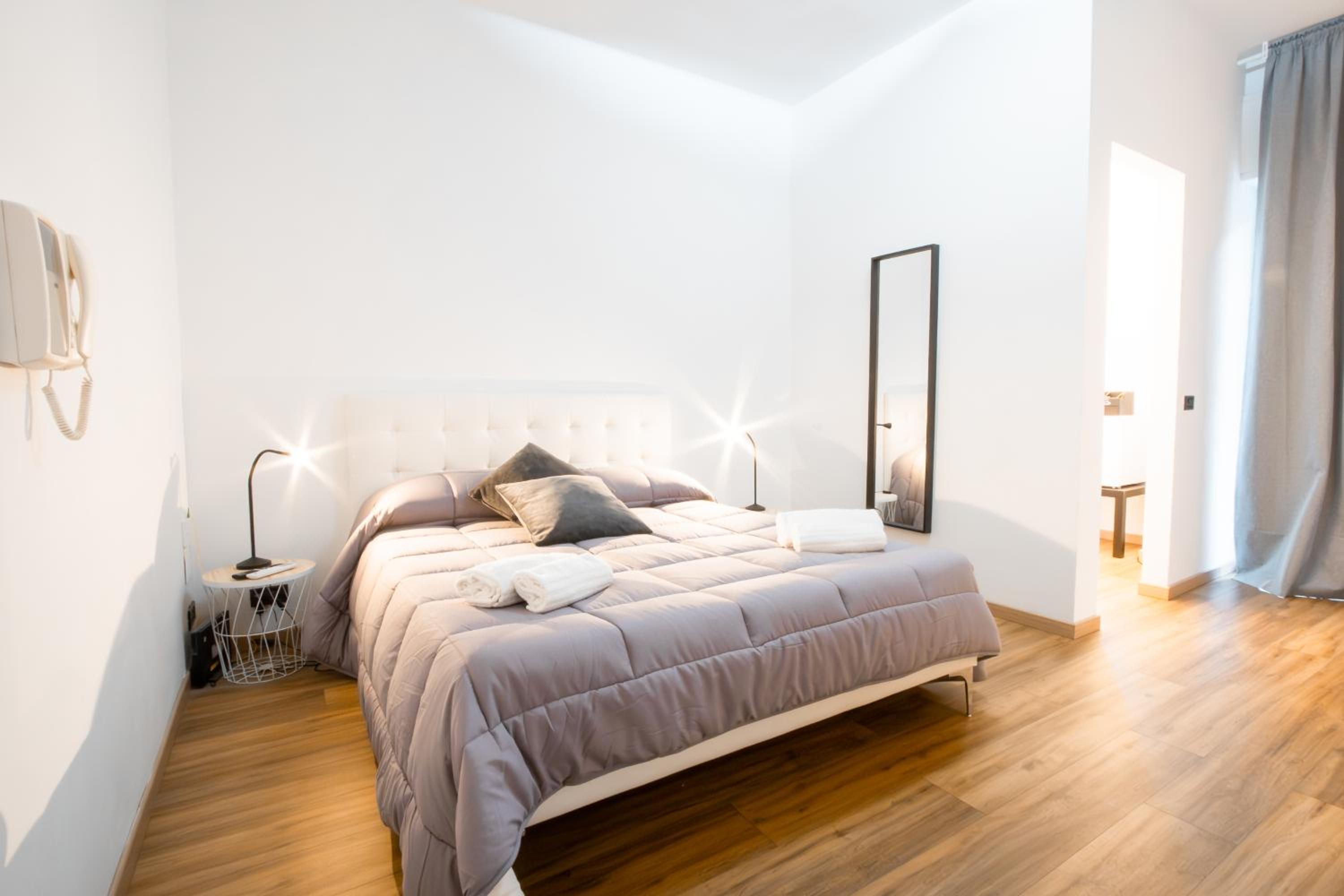 One-Bedroom Apartment with Balcony and City View