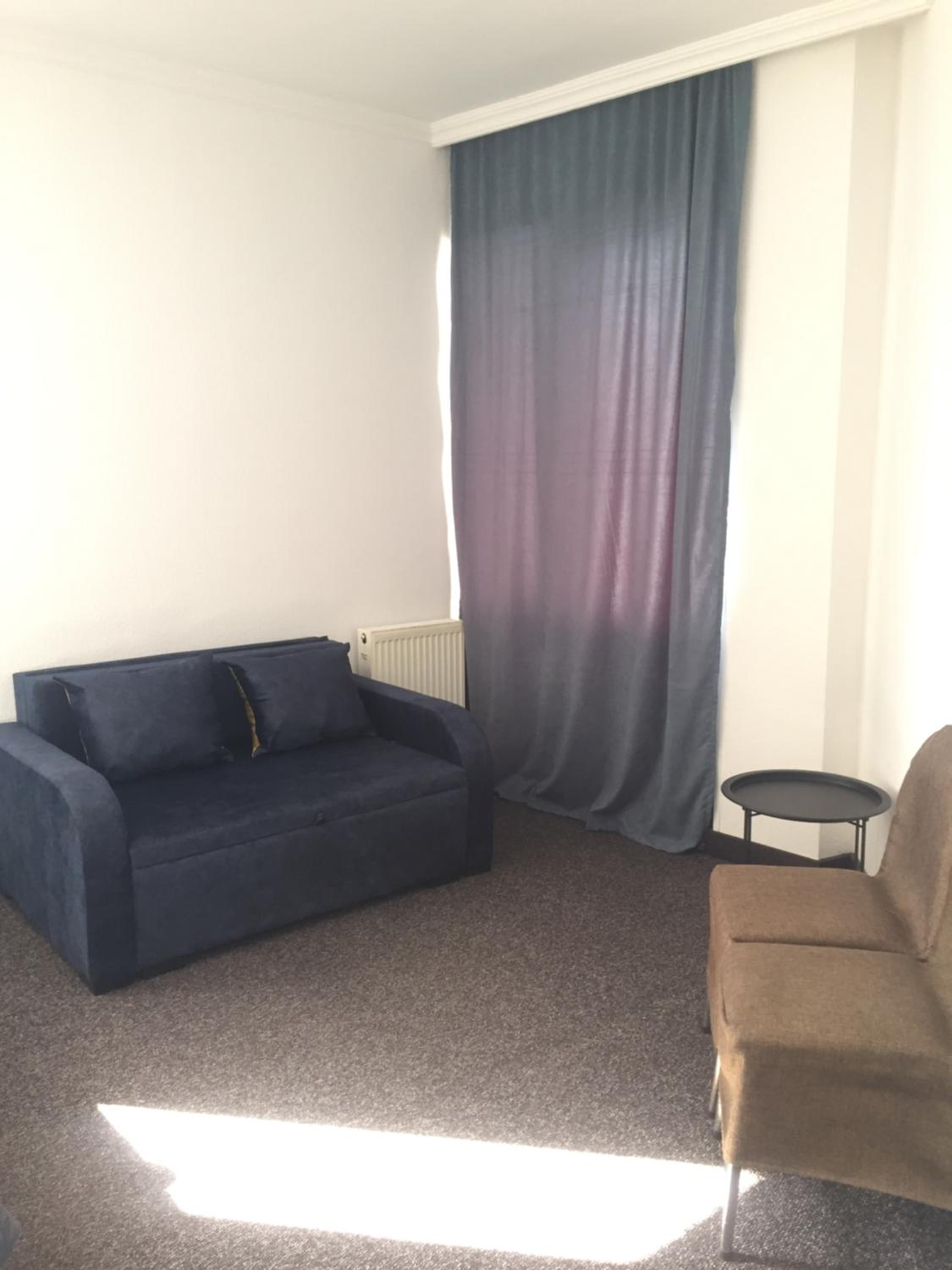 Economy Triple Room photo 2