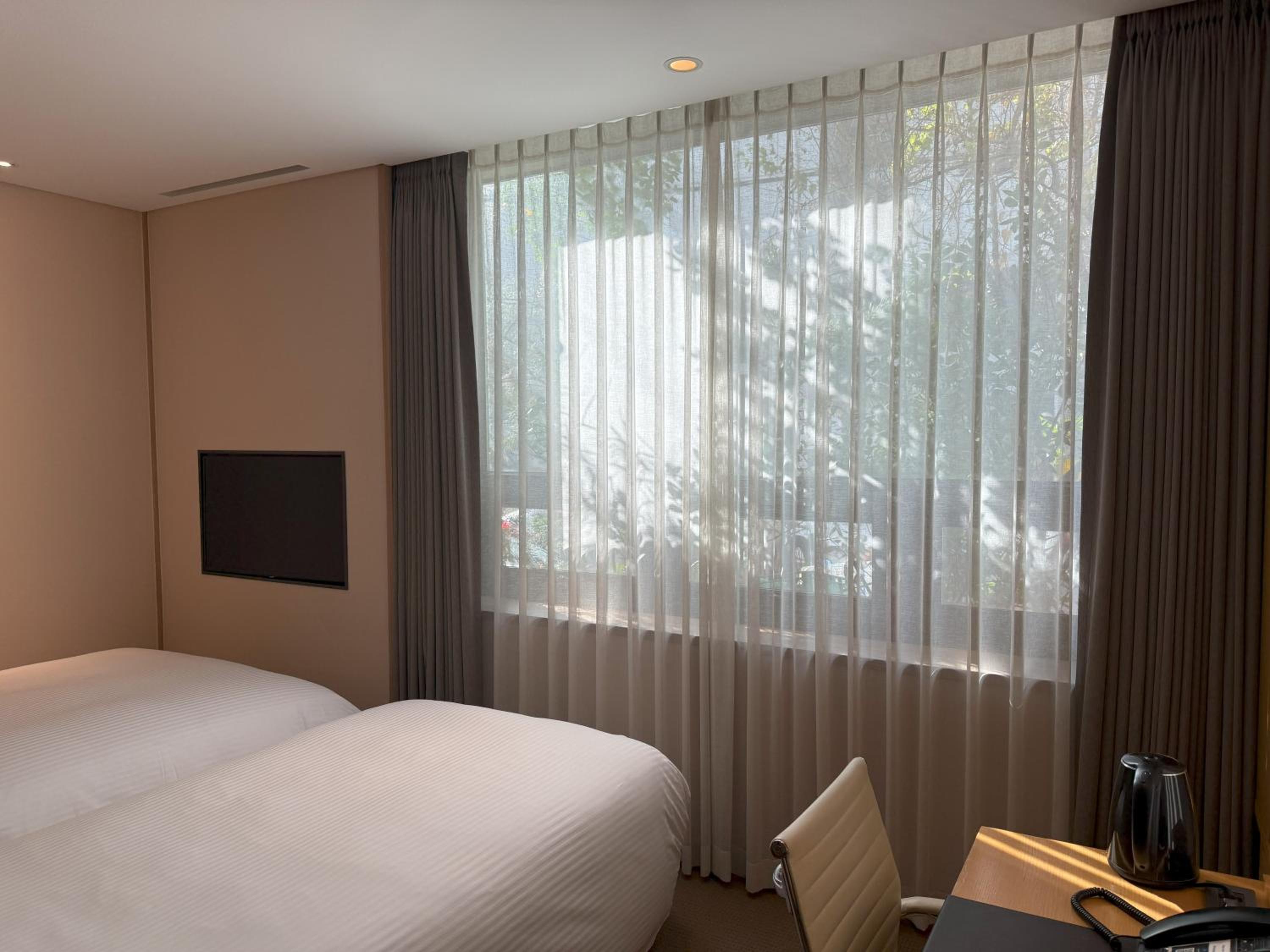 Standard Twin Room with Outdoor Tent(1 Double bed and 1 Single bed)